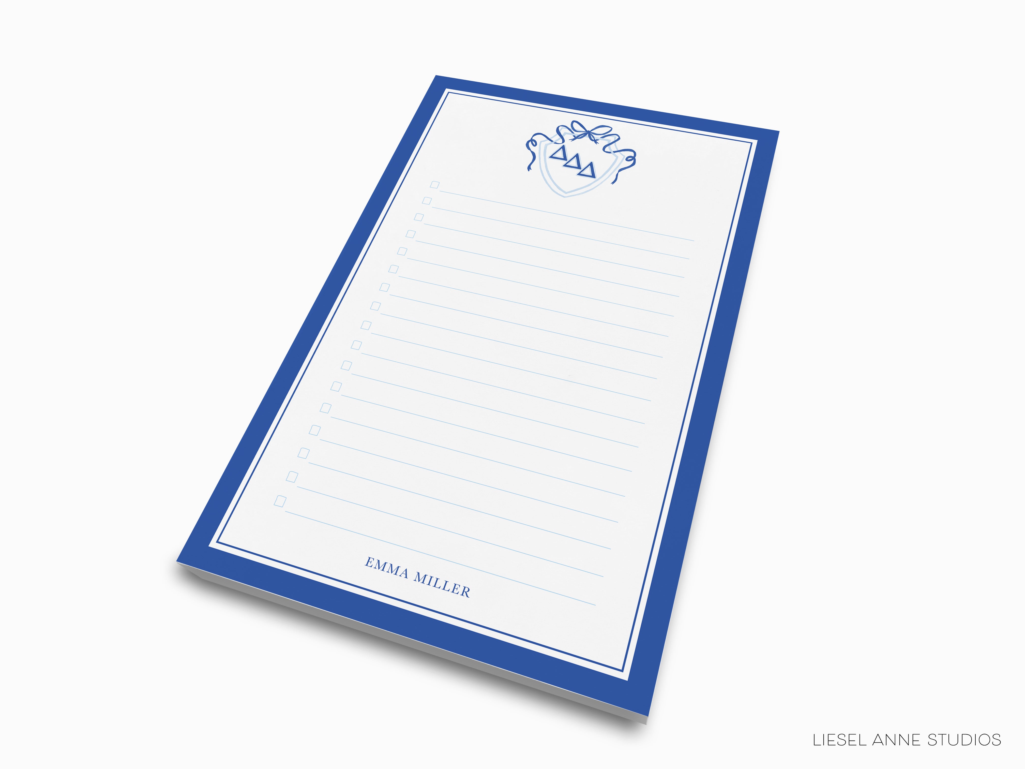 a blue and white notepad with a horse on it