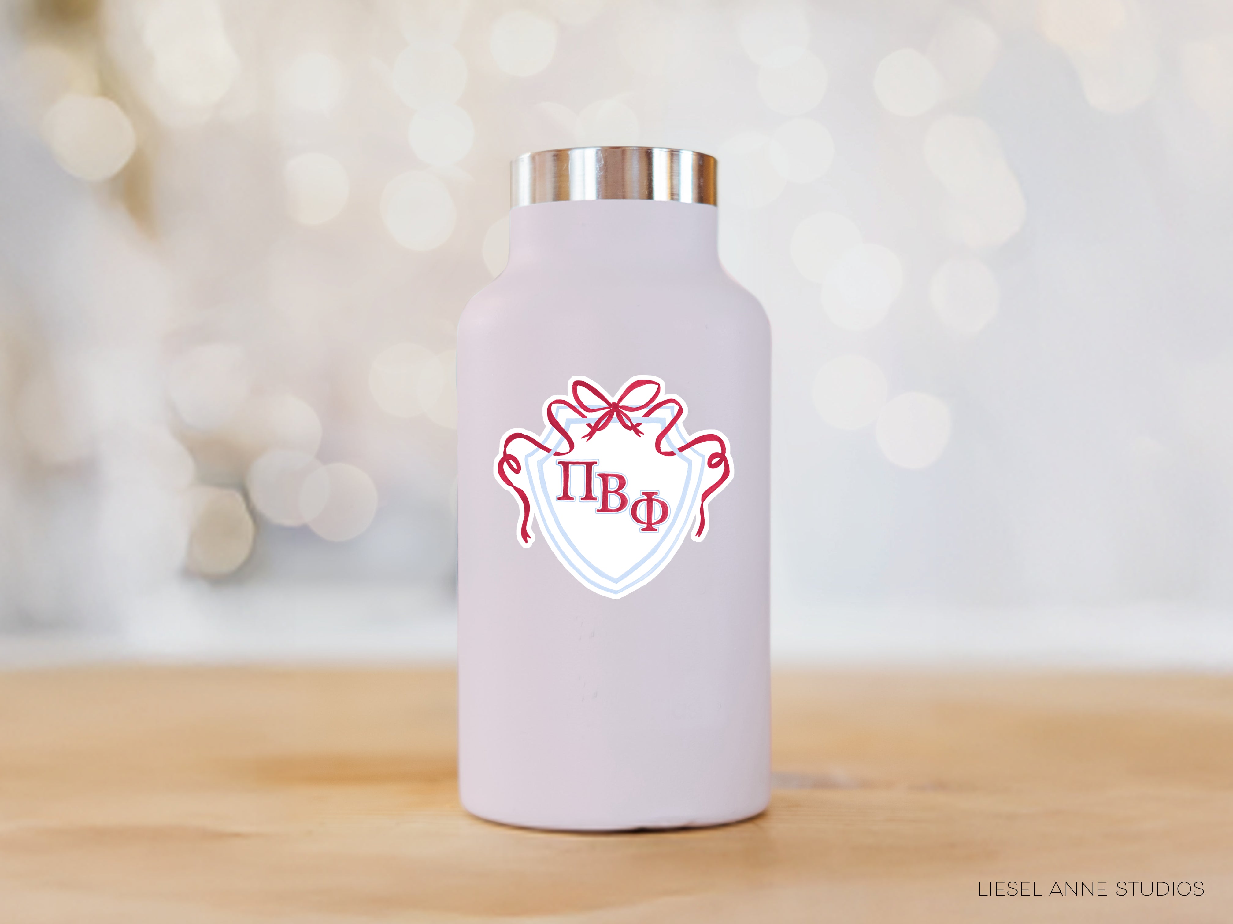 a white water bottle with a red and white logo on it
