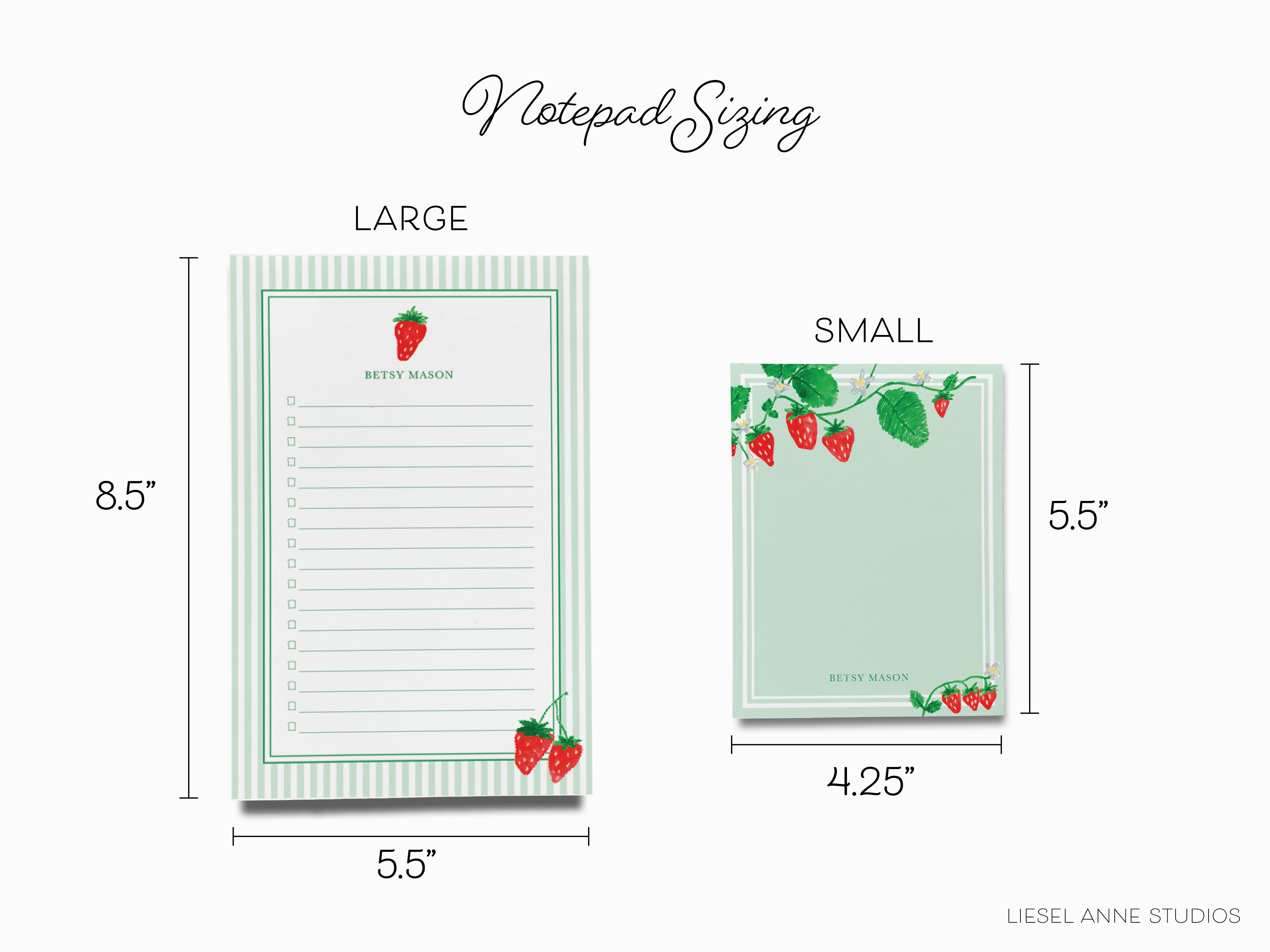 a notepad with a strawberry design on it