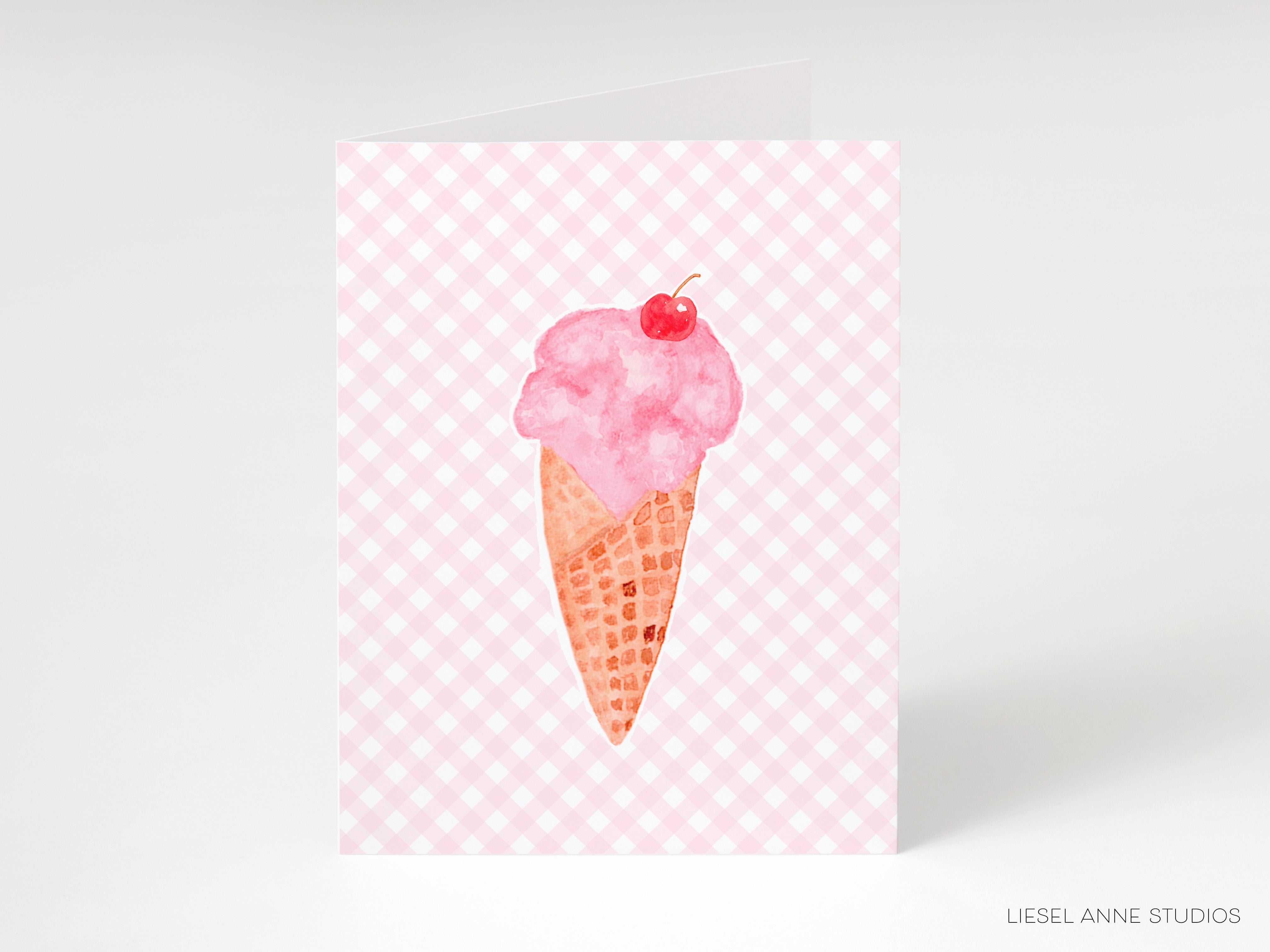 A pink and white checkered background with a watercolor illustration of a pink ice cream cone with a cherry on top.