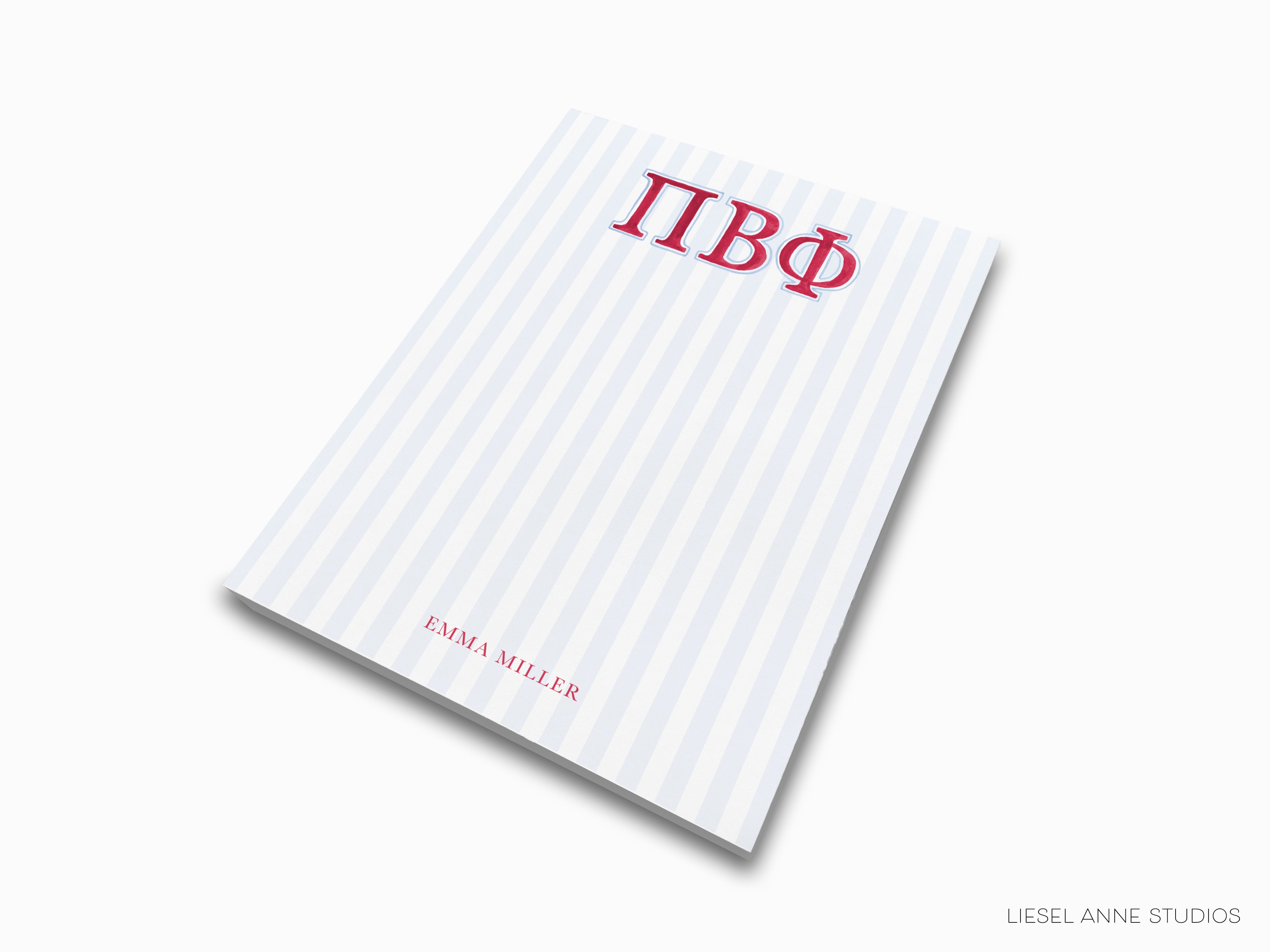 a striped notebook with the word tbq on it
