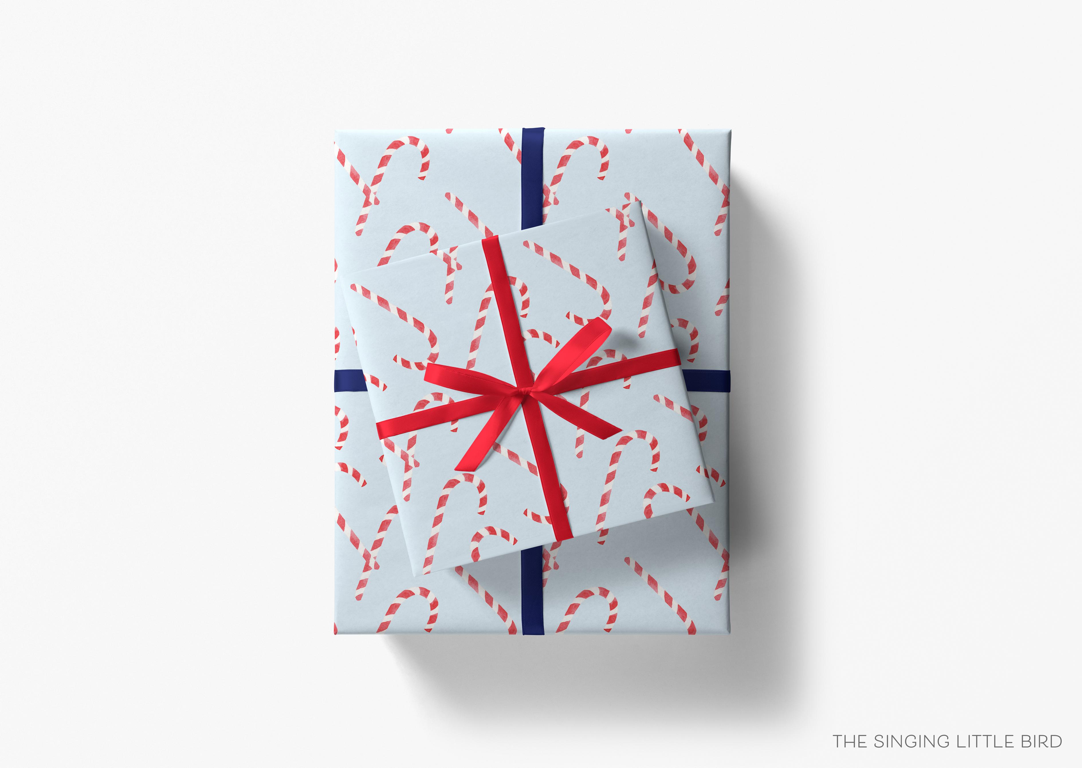 Candy Cane Light Blue Christmas Gift Wrap-This matte finish gift wrap features our hand-painted watercolor gingerbread candy canes. It makes a perfect wrapping paper for a holiday present. -The Singing Little Bird