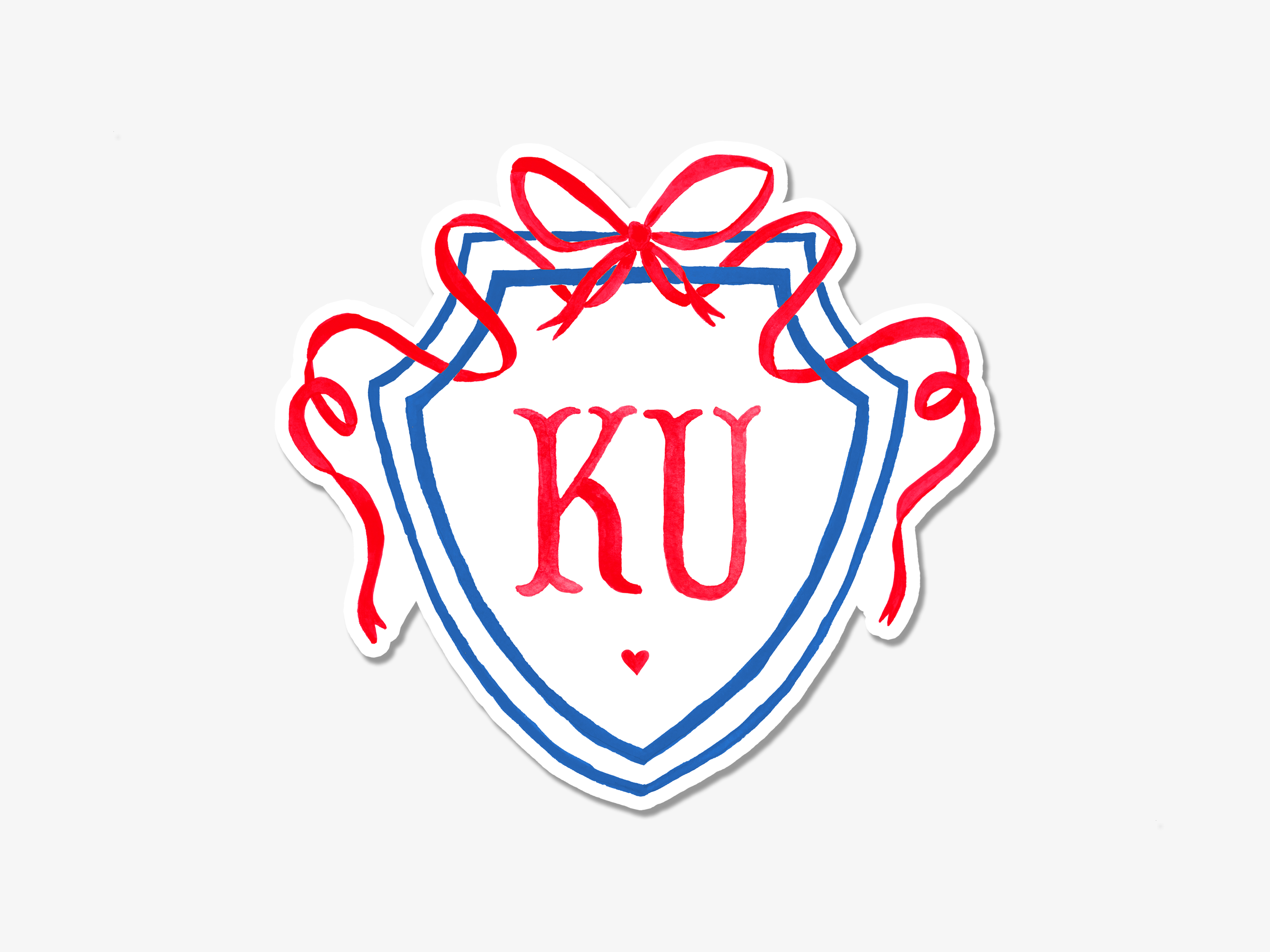 A shield-shaped logo with the letters 'KU' in the center, surrounded by red ribbons.