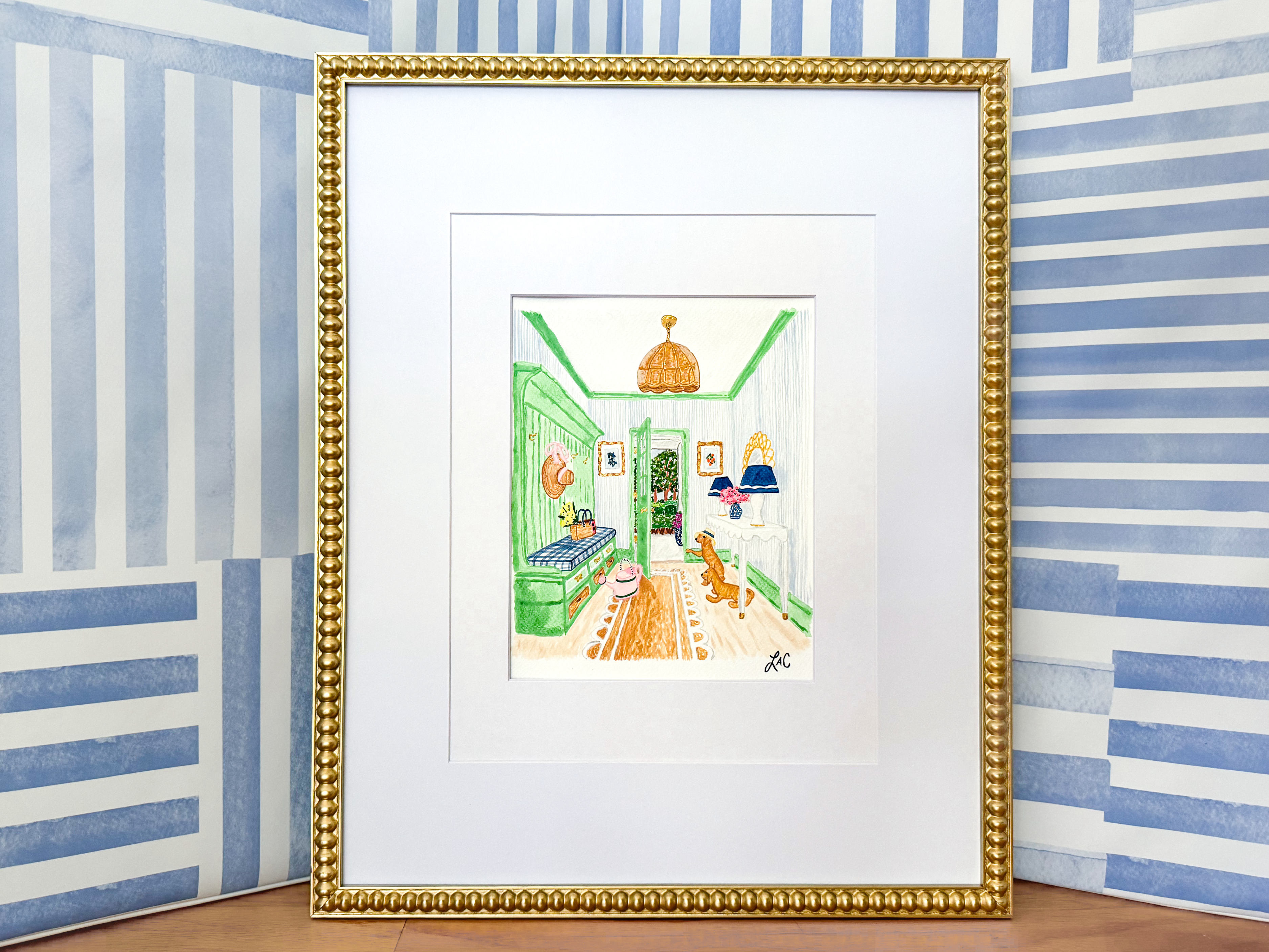 a framed painting of a room with a green door, a brown lamp, and a cat sitting on the floor.