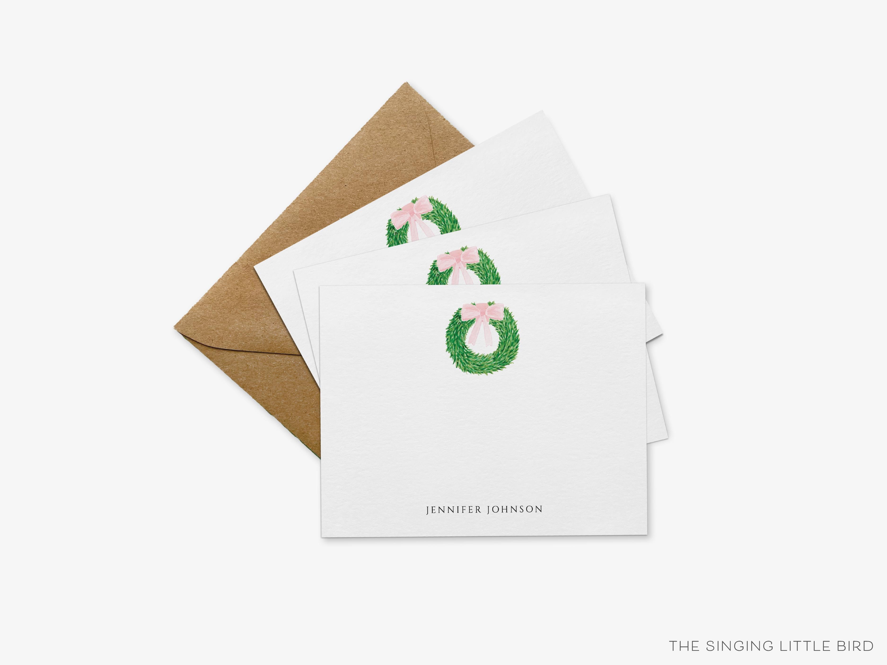 Personalized Wreath with Pink Bow Flat Notes-These personalized flat notecards are 4.25x5.5 and feature our hand-painted watercolor wreath with a pink bow, printed in the USA on 120lb textured stock. They come with your choice of envelopes and make great thank yous and gifts for the spring lover in your life.-The Singing Little Bird