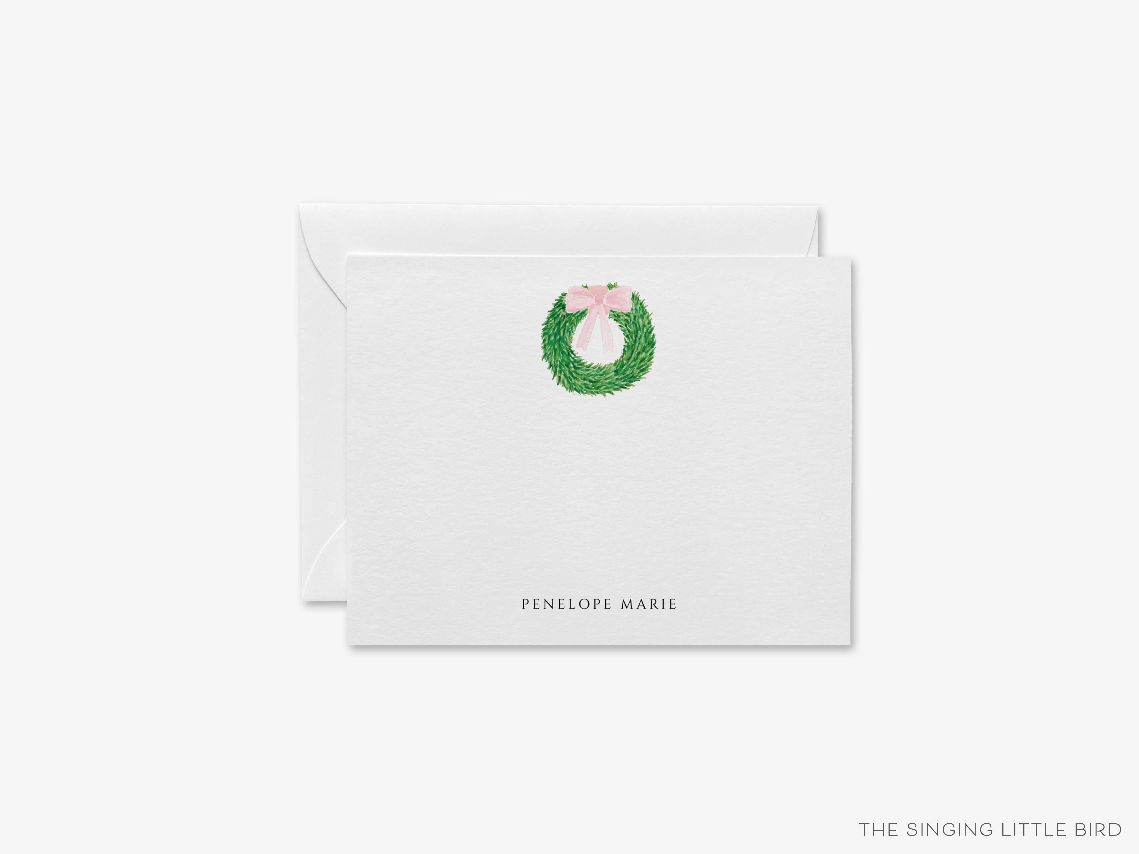 Personalized Wreath with Pink Bow Flat Notes-These personalized flat notecards are 4.25x5.5 and feature our hand-painted watercolor wreath with a pink bow, printed in the USA on 120lb textured stock. They come with your choice of envelopes and make great thank yous and gifts for the spring lover in your life.-The Singing Little Bird