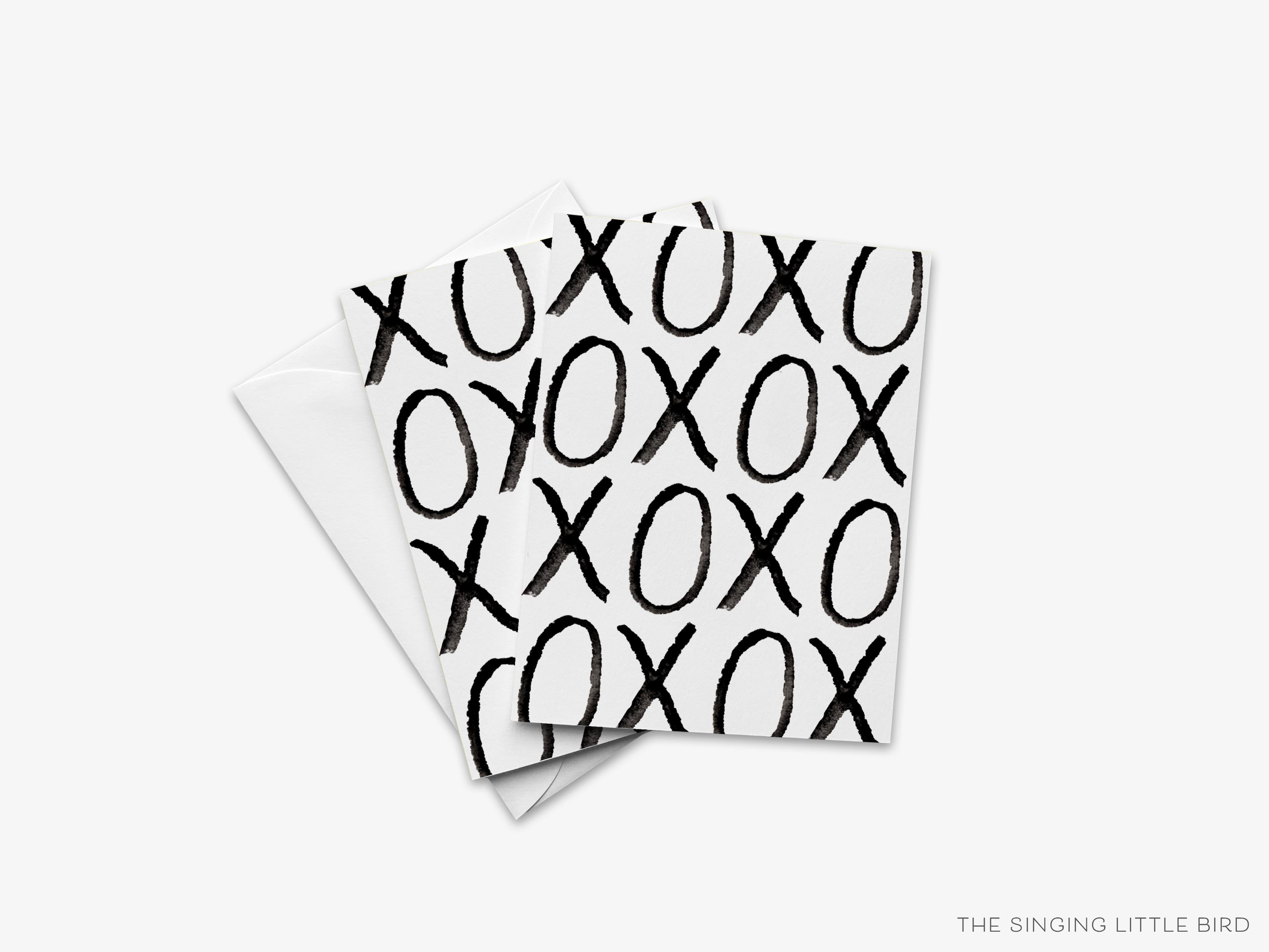 XOXO Black Bold Greeting Card-These folded greeting cards are 4.25x5.5 and feature our hand-painted watercolor XO design, printed in the USA on 100lb textured stock. They come with a White envelope and make a great thank you or valentine for the special loved ones in your life.-The Singing Little Bird