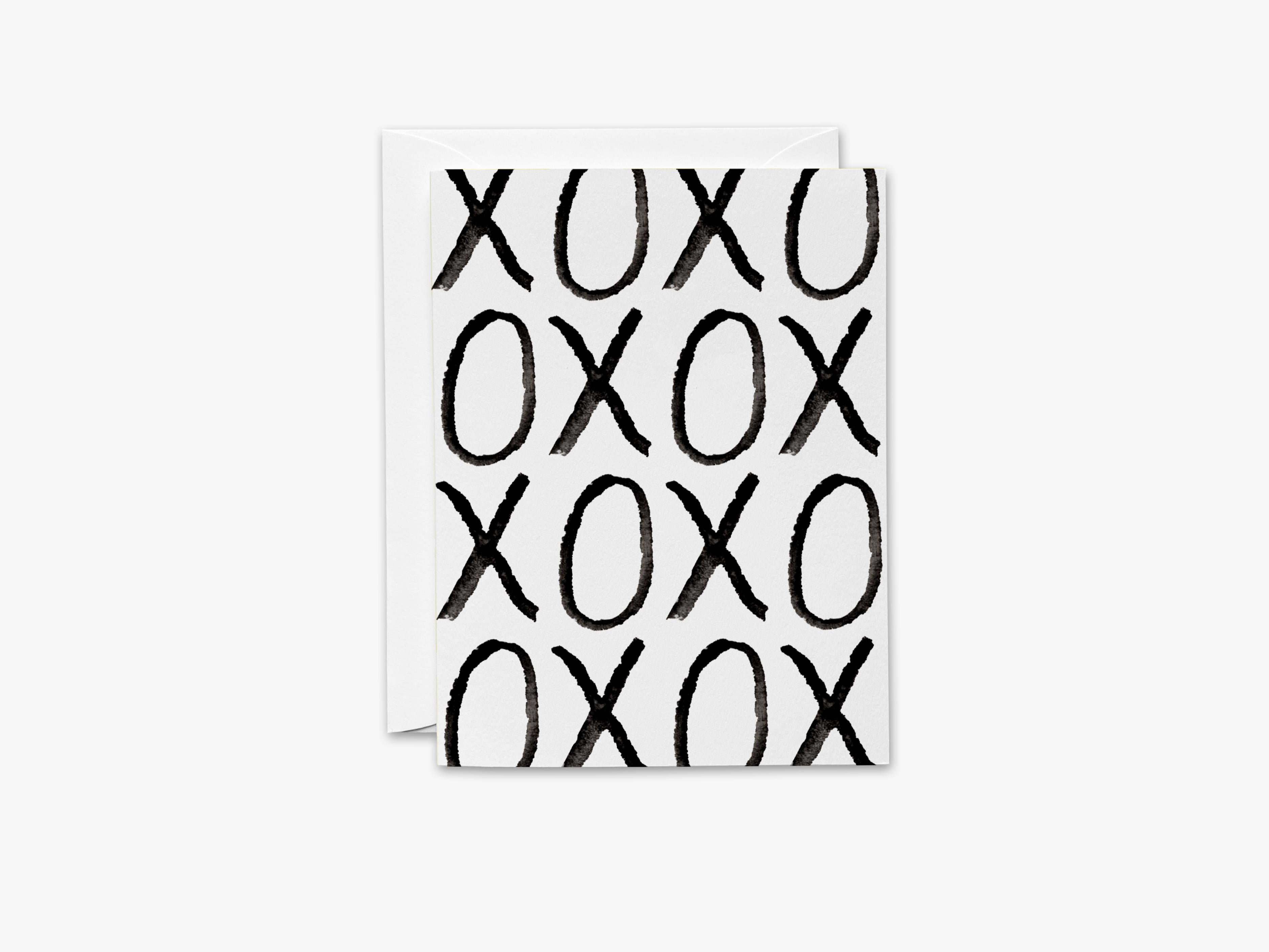 XOXO Black Bold Greeting Card-These folded greeting cards are 4.25x5.5 and feature our hand-painted watercolor XO design, printed in the USA on 100lb textured stock. They come with a White envelope and make a great thank you or valentine for the special loved ones in your life.-The Singing Little Bird