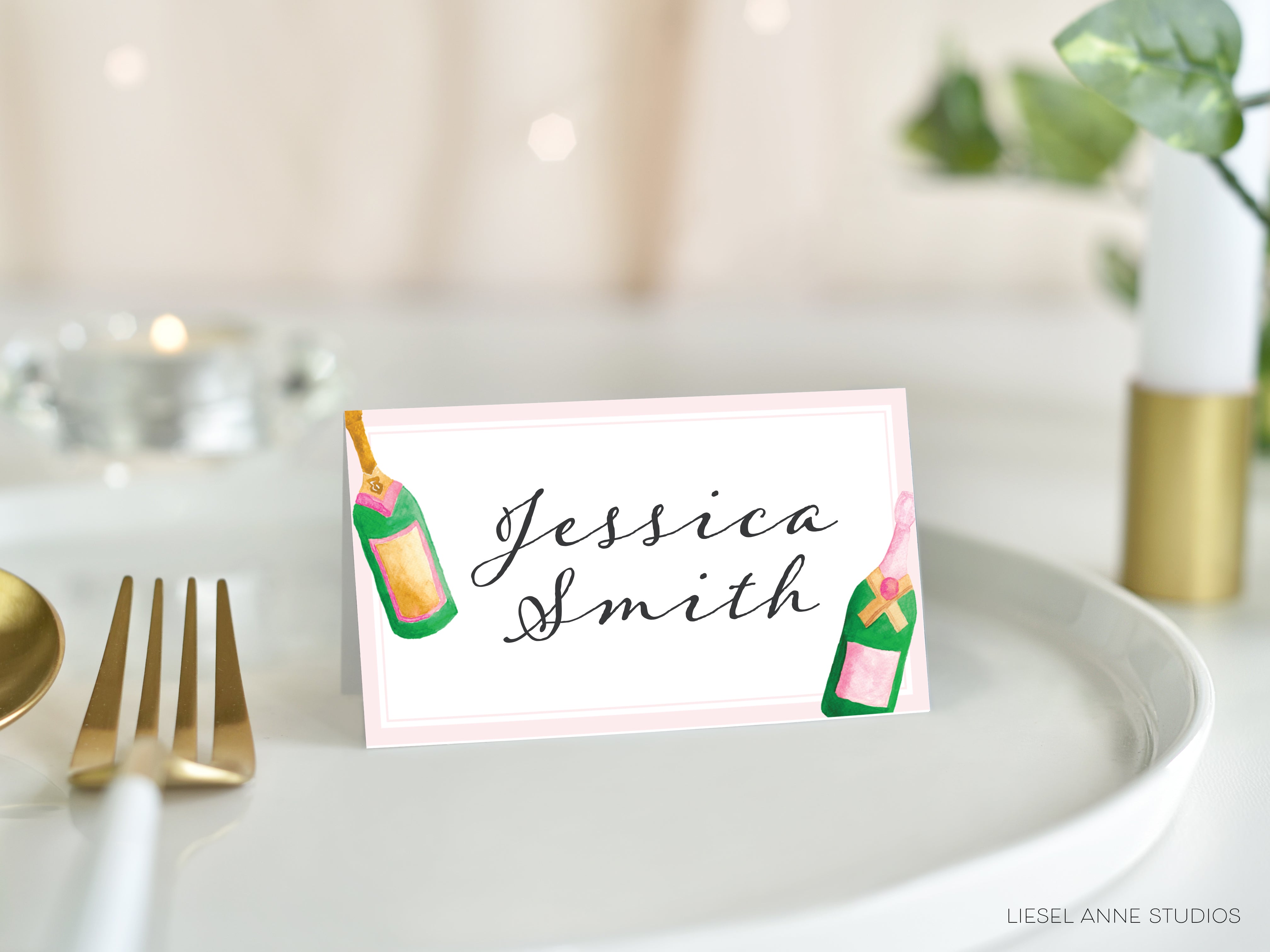 A place card with the name 'JESSICA SMITH' written on it, placed on a white plate with a fork and a candle in the background.