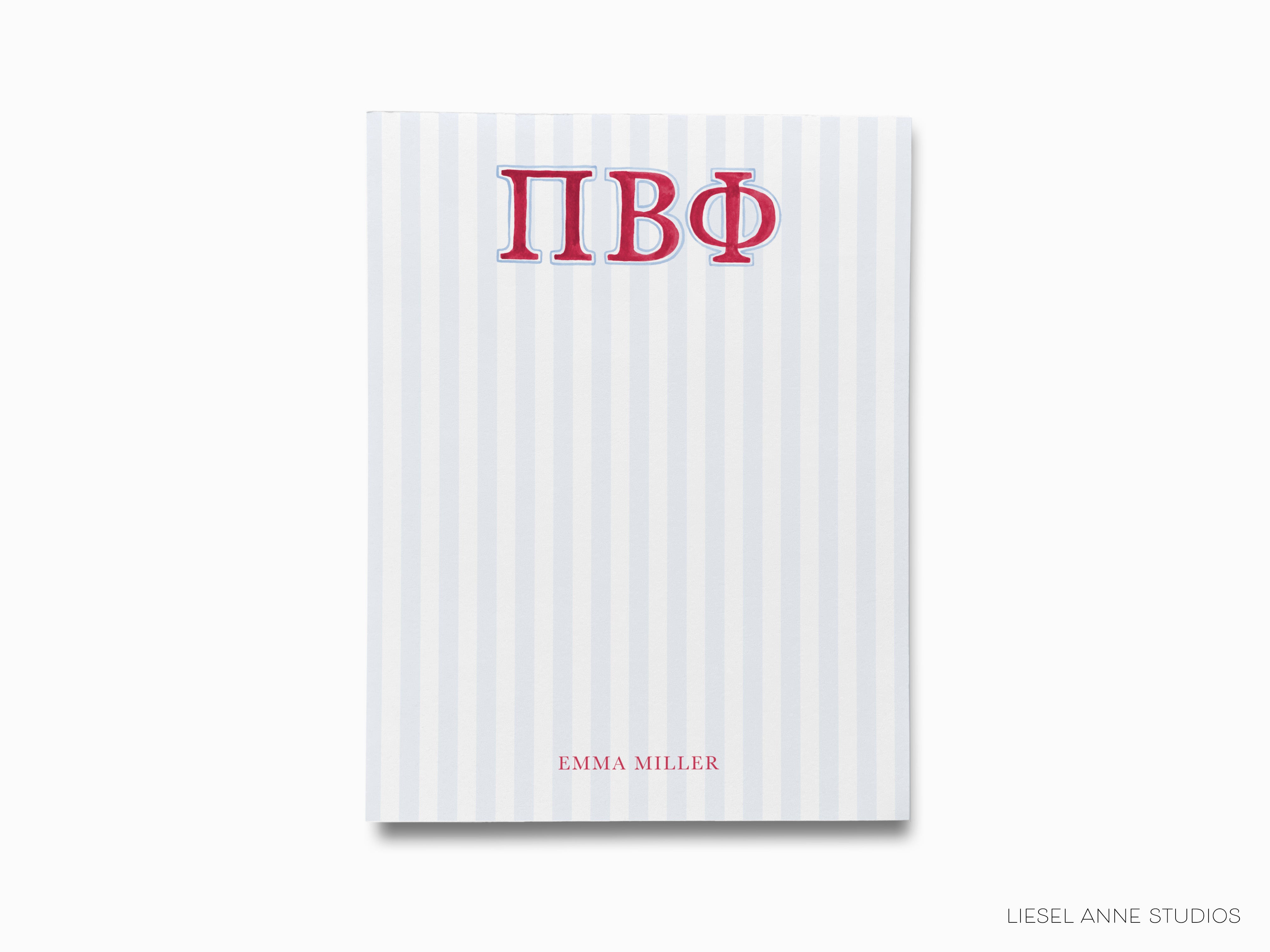 a white and red striped book with a greek letter on it