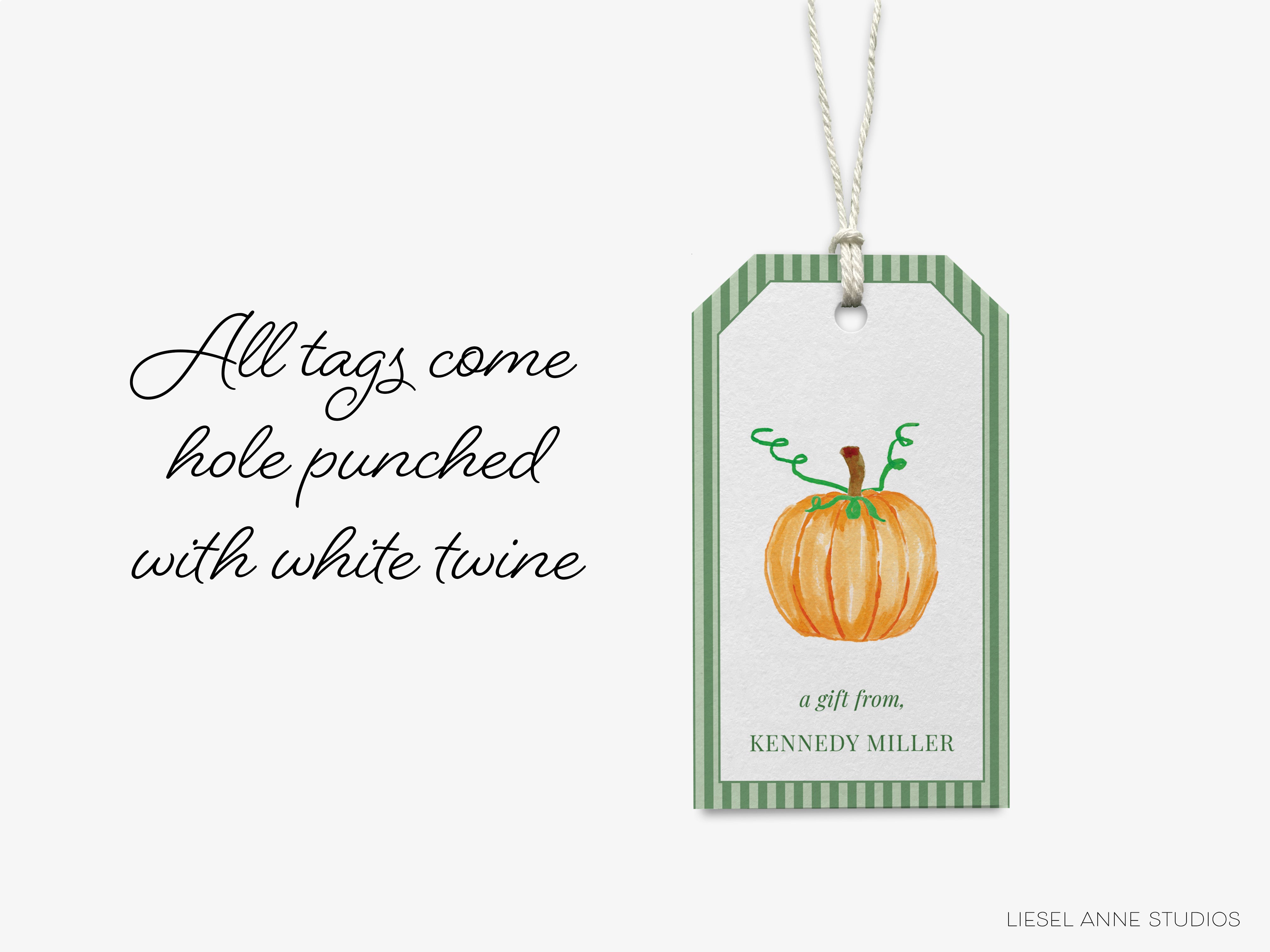 a tag with a pumpkin graphic and text that reads "All tags come hole punched with white twine" and "a gift from KENNY MILLER".