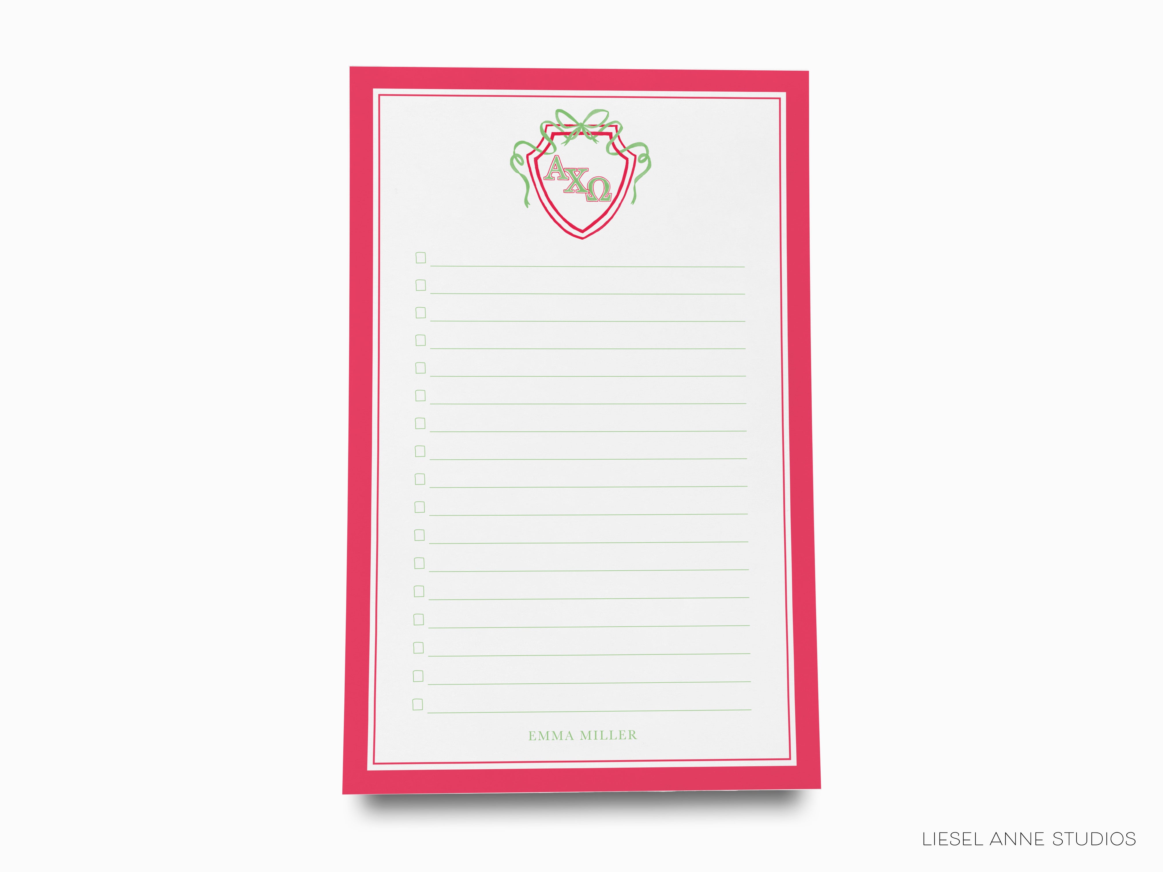 a notepad with a red border and a pink border