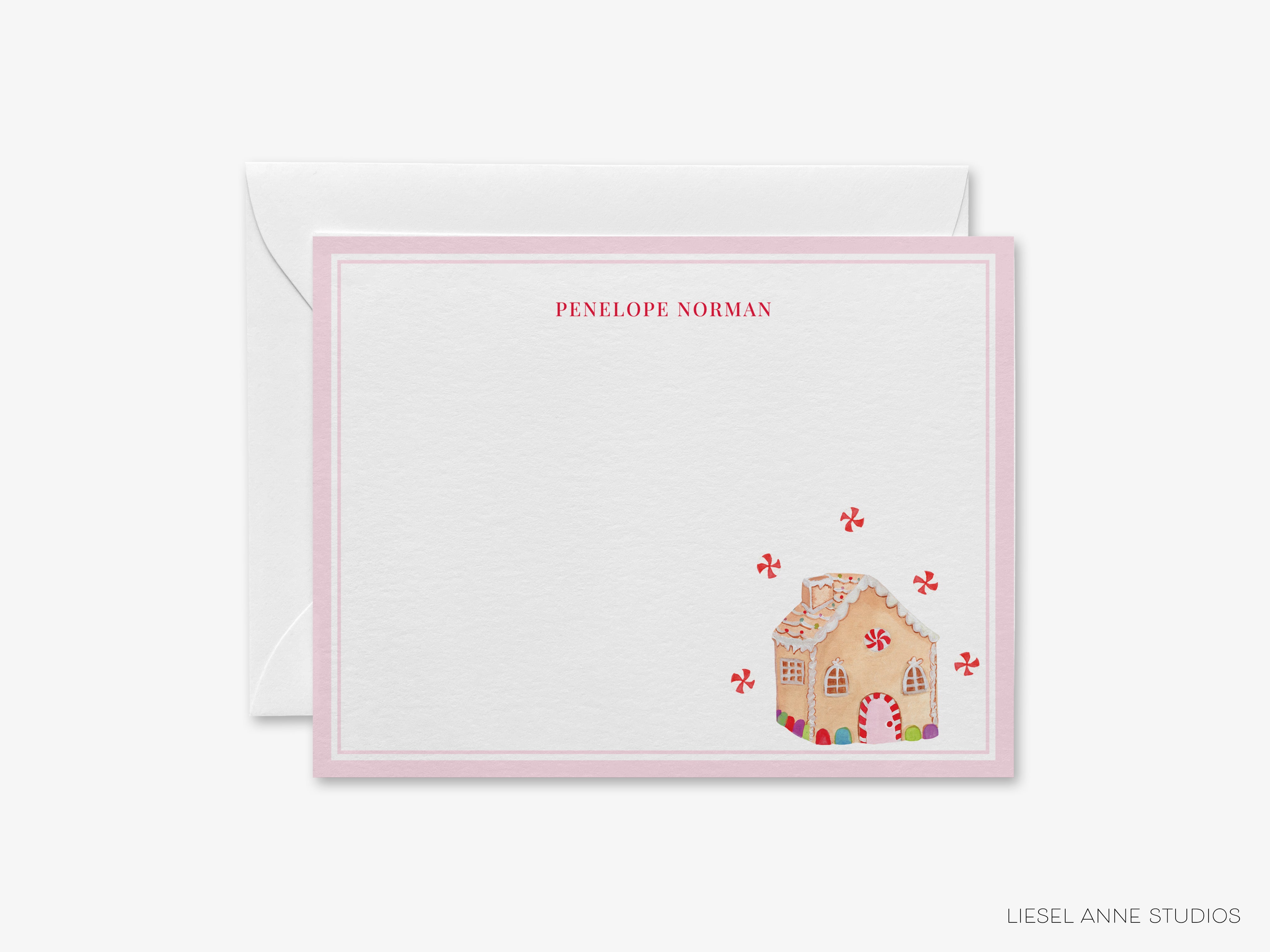 a card with a gingerbread house on it