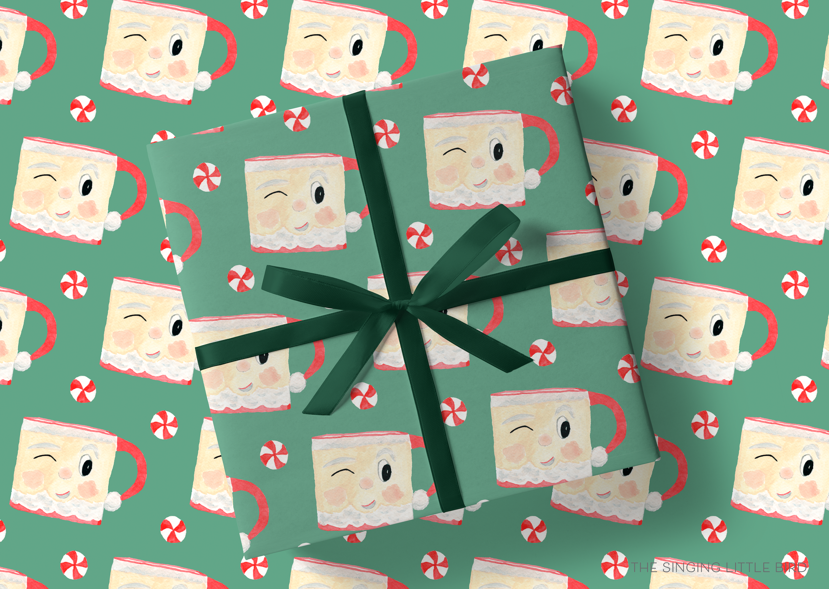 a pattern of Santa Claus mugs with red and white polka dots, all wrapped in green gift paper with a green ribbon bow.