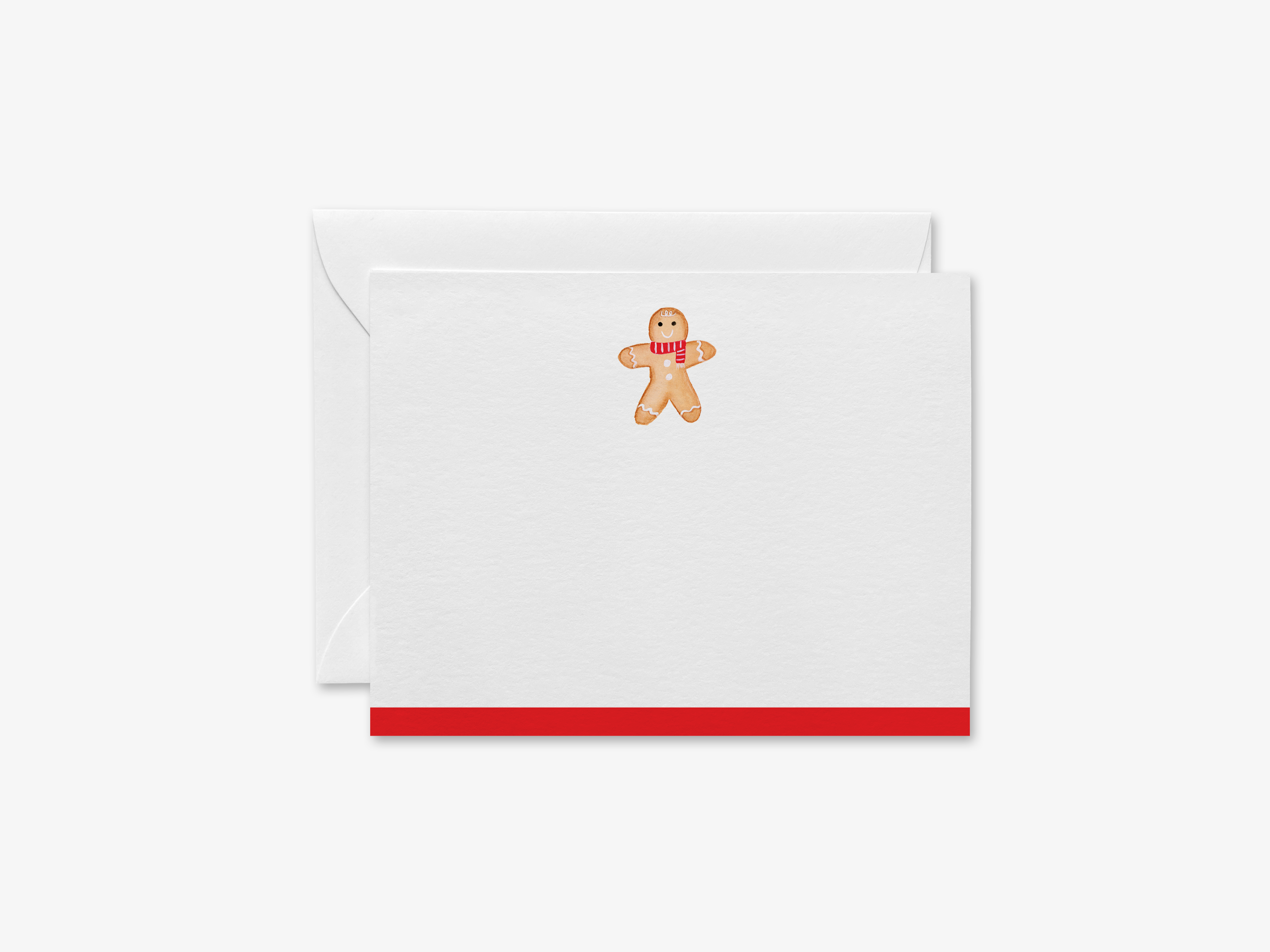A white card with a red stripe and a gingerbread man illustration on it.