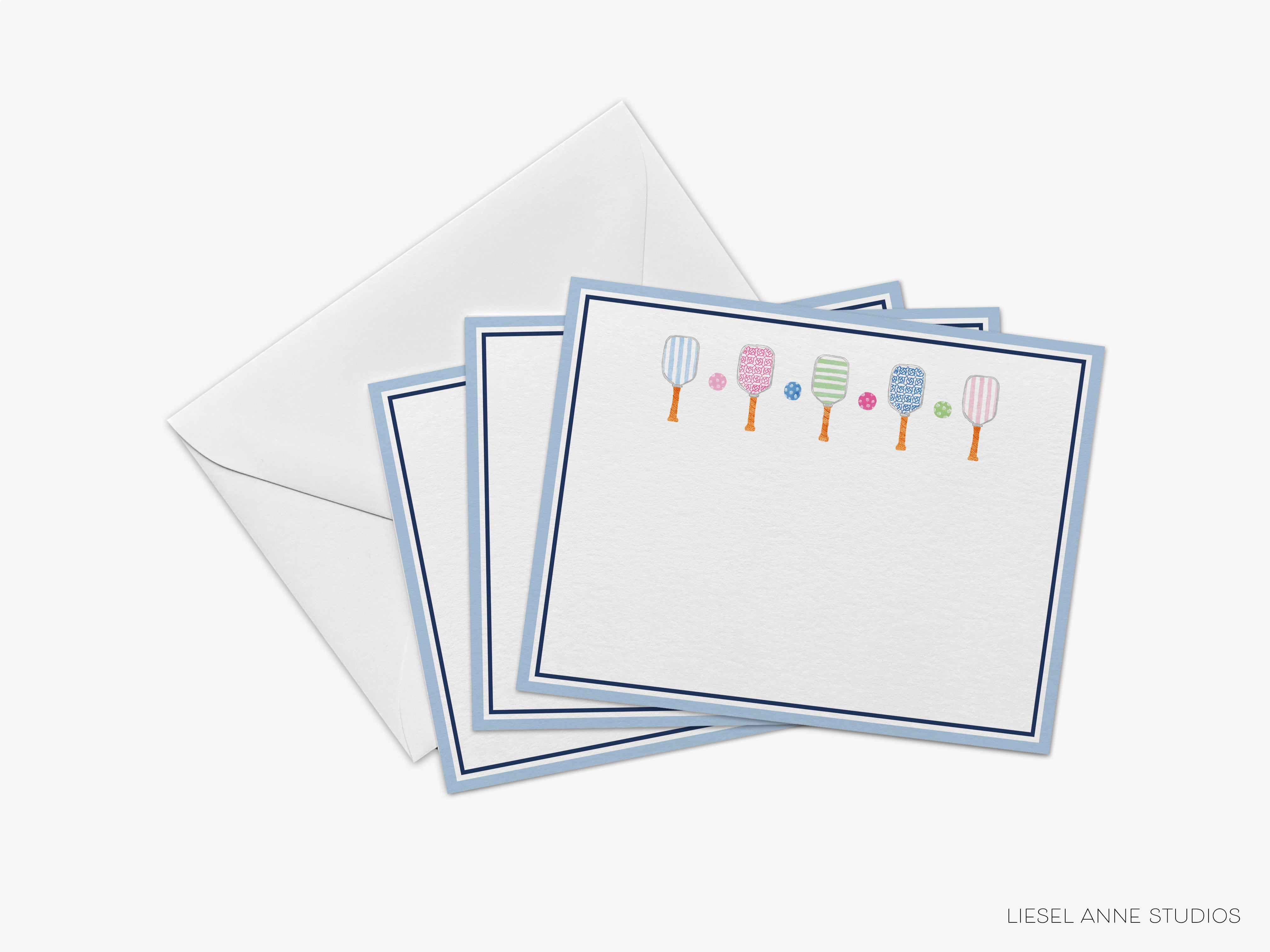 a set of four blank cards with a blue border, each containing a line of colorful paddleball illustrations.