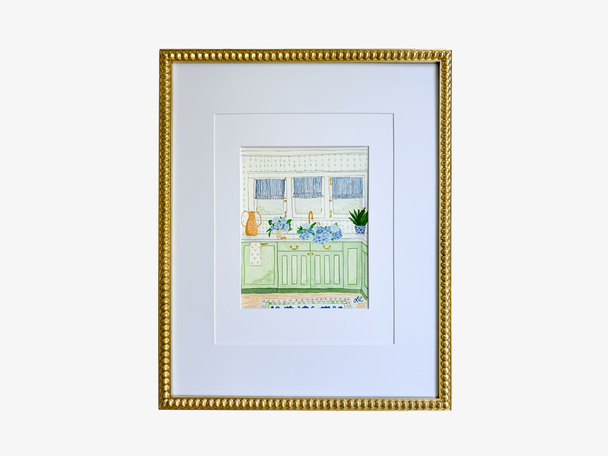 The image is a framed painting depicting a kitchen scene with a sink, cabinets, and various decorative elements such as a vase and potted plants.