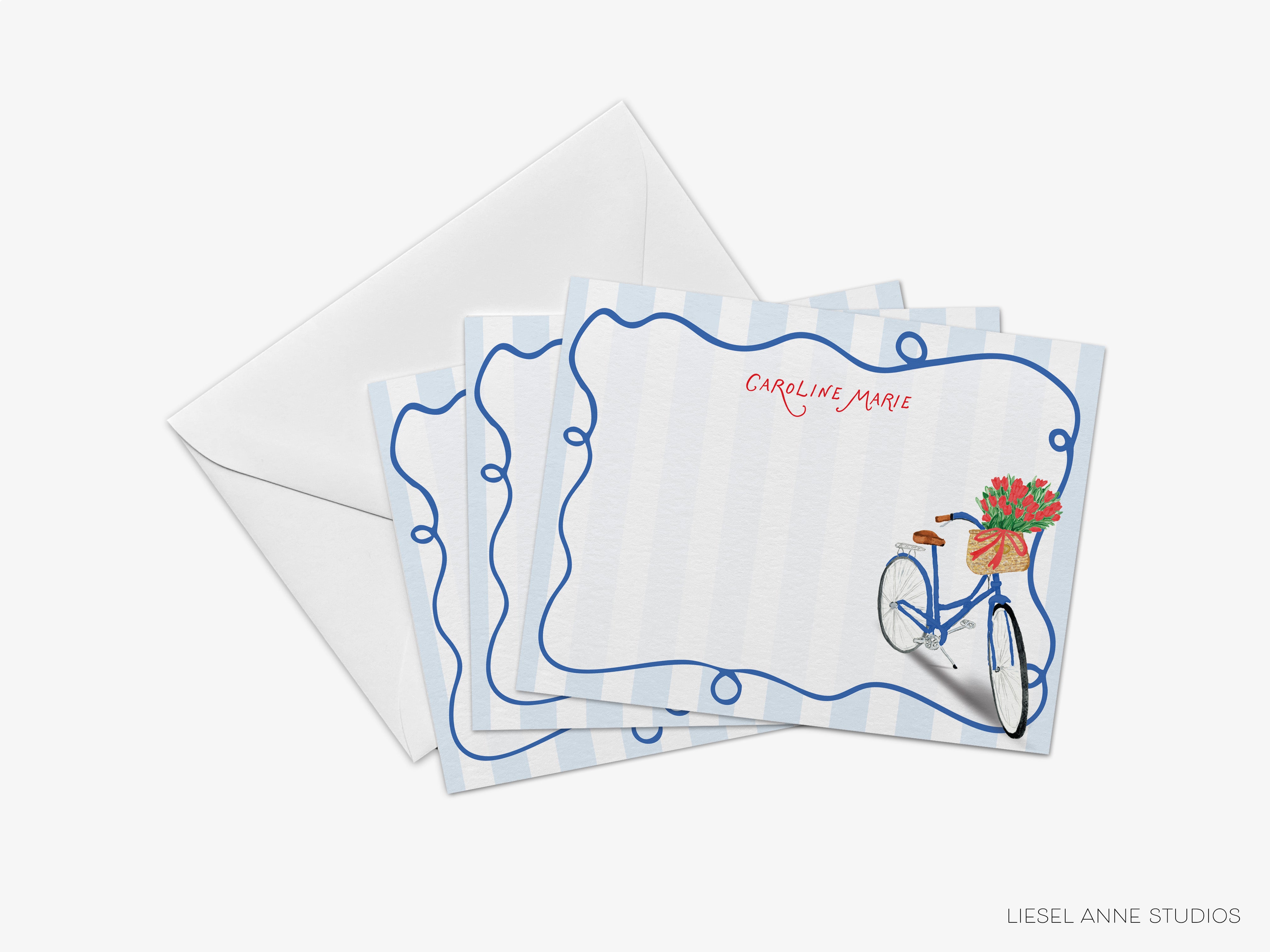 a set of three blue and white postcards with a bicycle illustration on them.