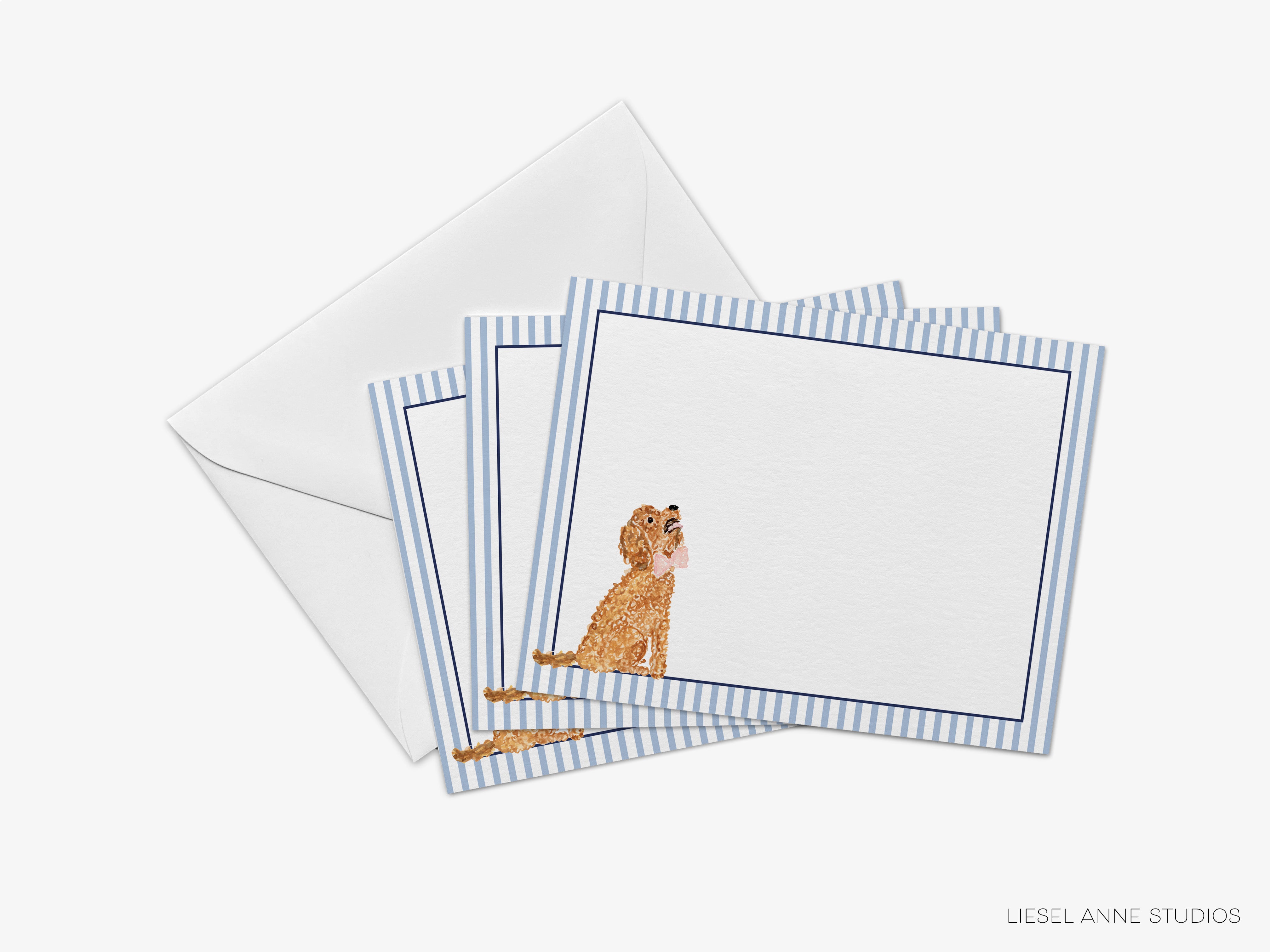 A set of four blank greeting cards with a dog illustration on them, placed on top of an envelope.