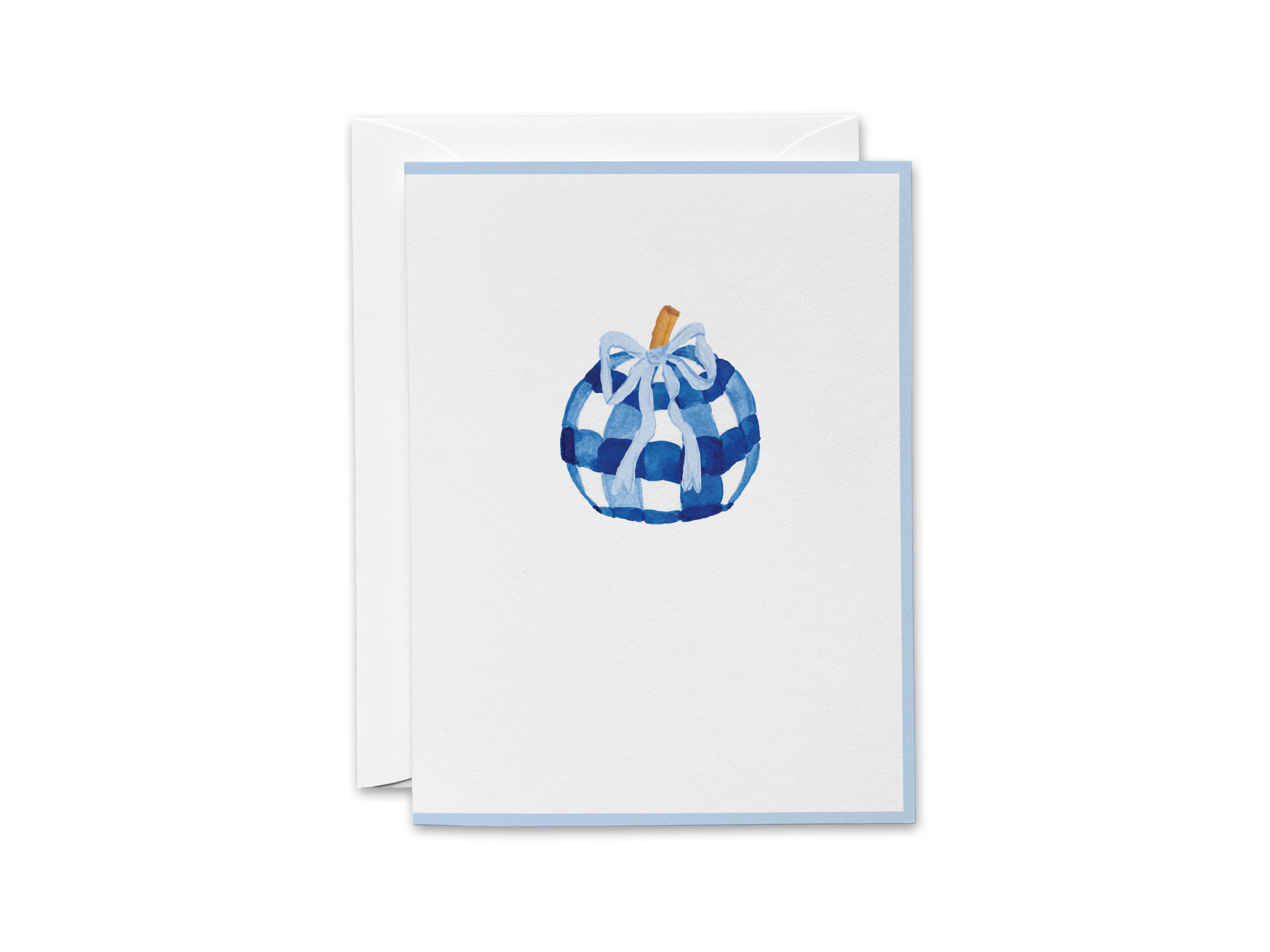 A white greeting card with a blue and white checkered pattern and a bow on top.