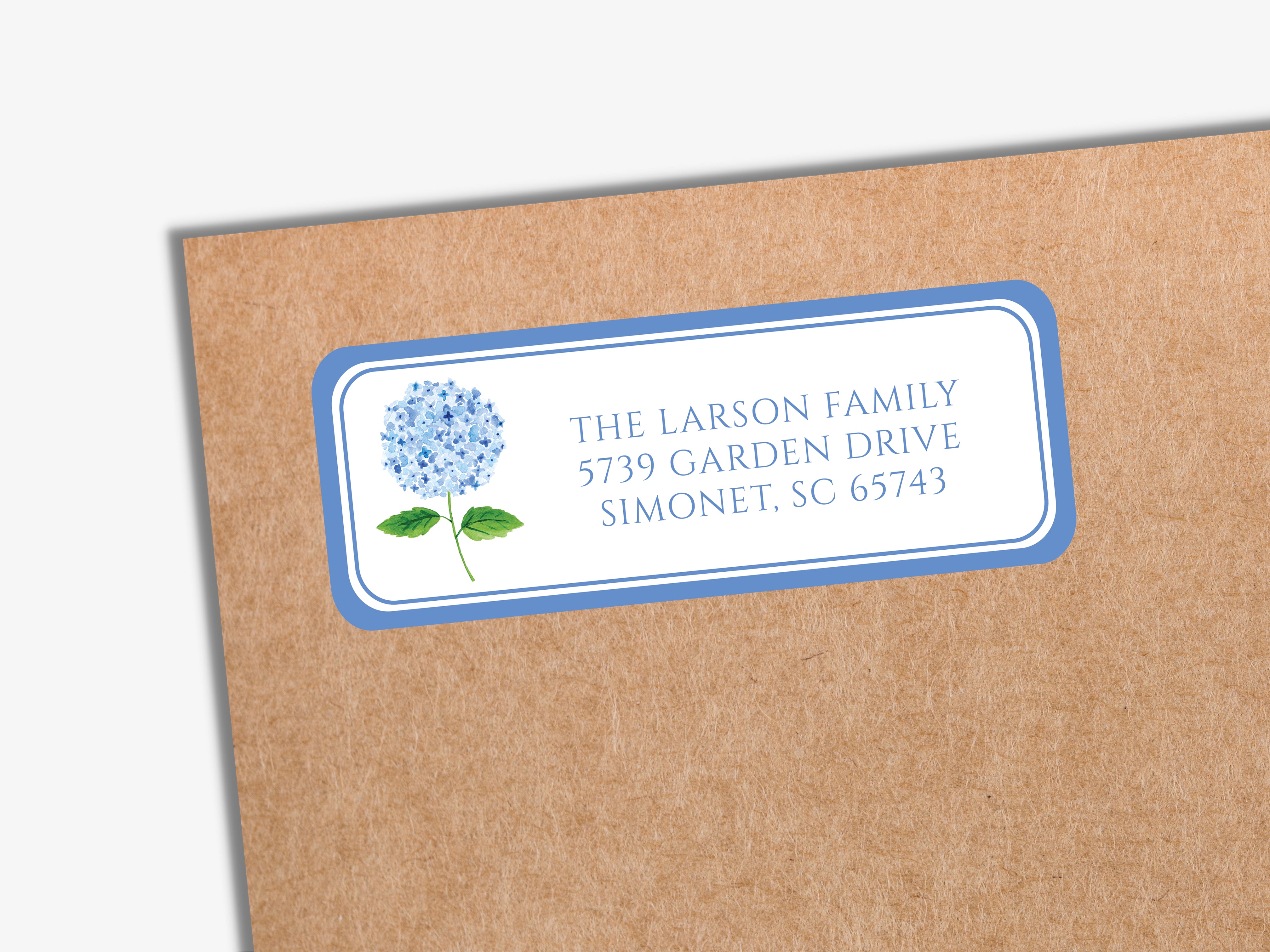 a label with a blue border and a watercolor illustration of a blue hydrangea flower.