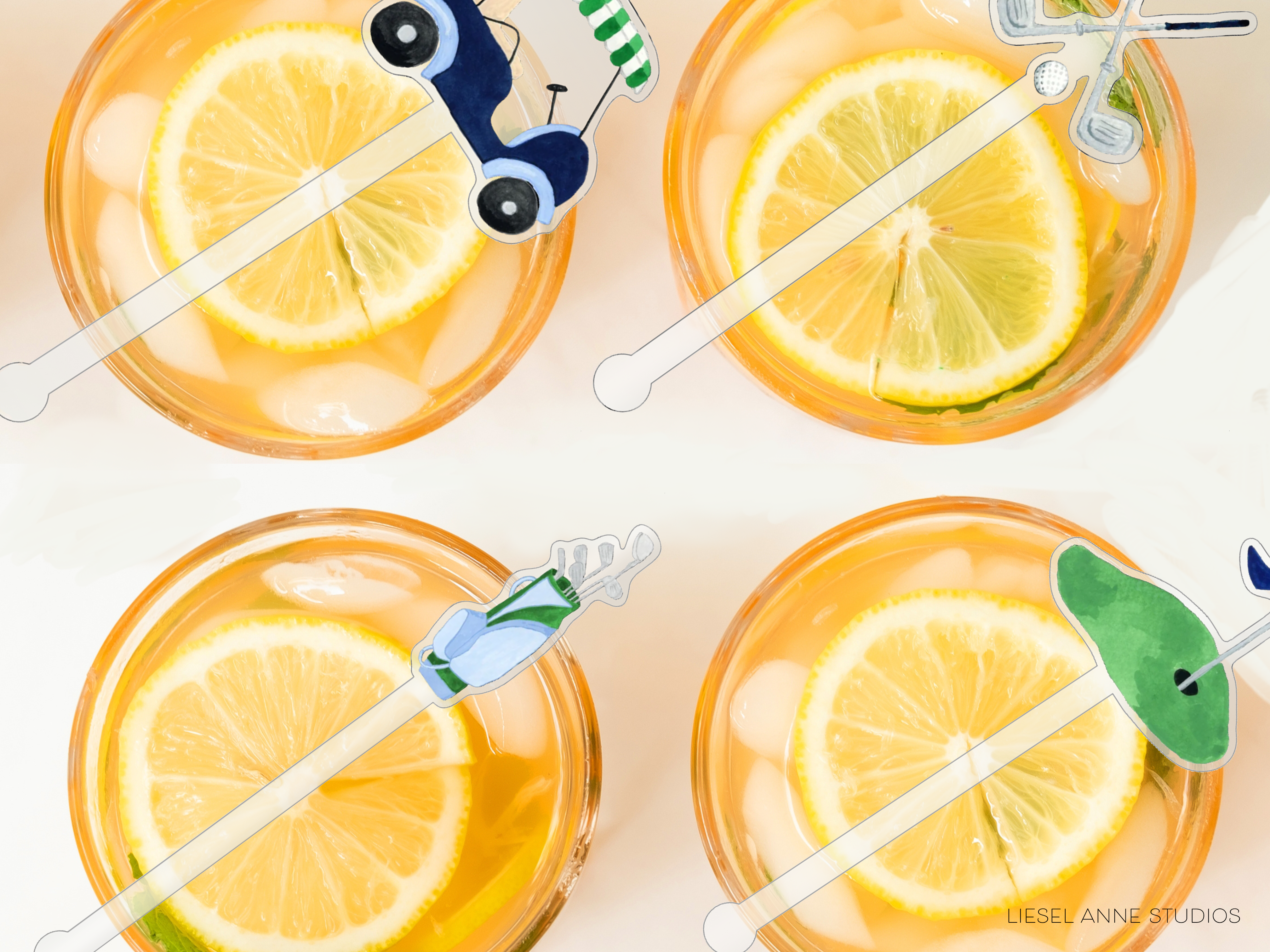 four glasses filled with a yellow liquid, each containing a slice of lemon. The glasses are decorated with colorful straws and other garnishes, creating a visually appealing and vibrant presentation.