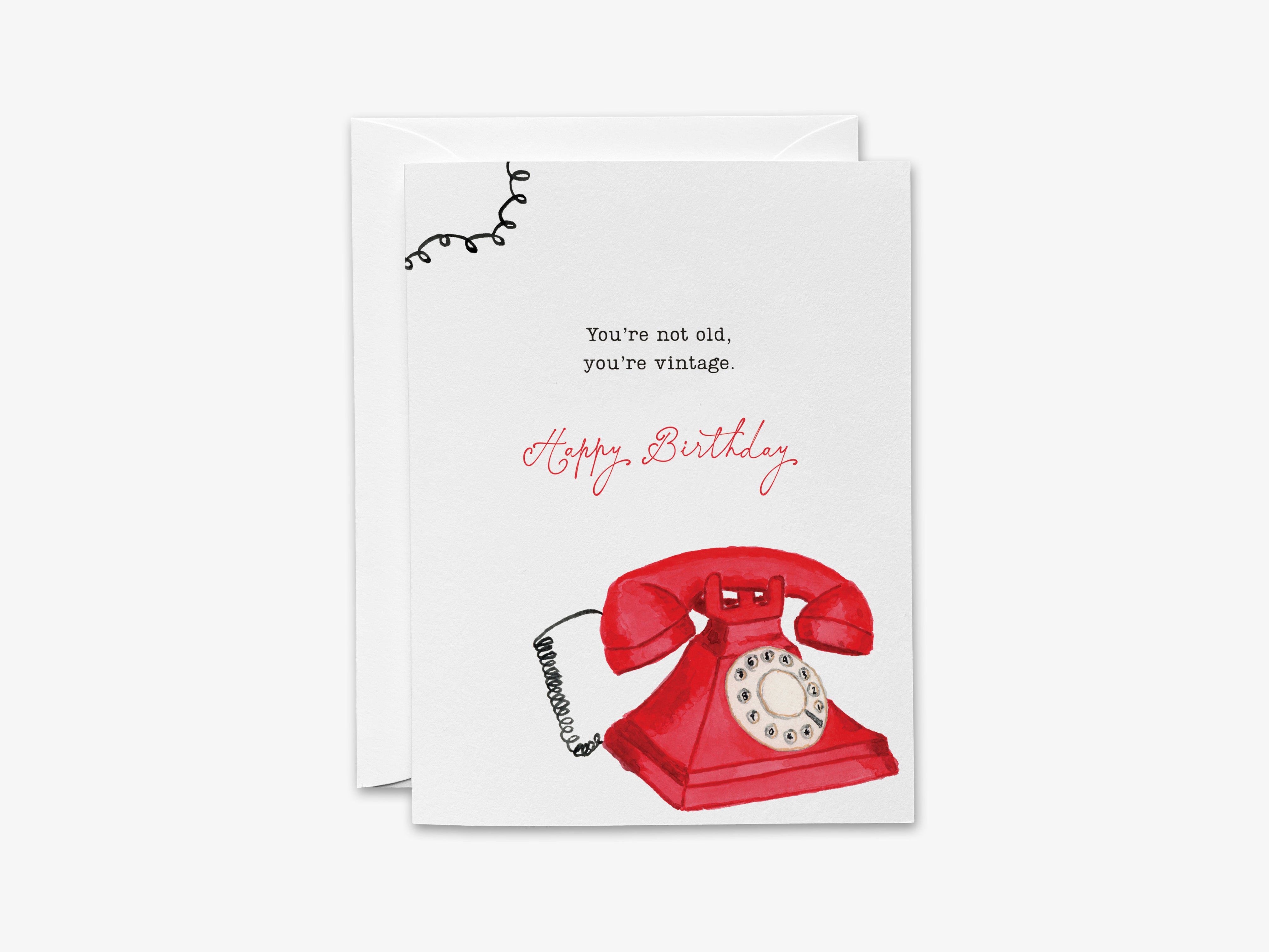 The image is a birthday card with a red telephone illustration and a message that reads "You're not old, you're vintage."