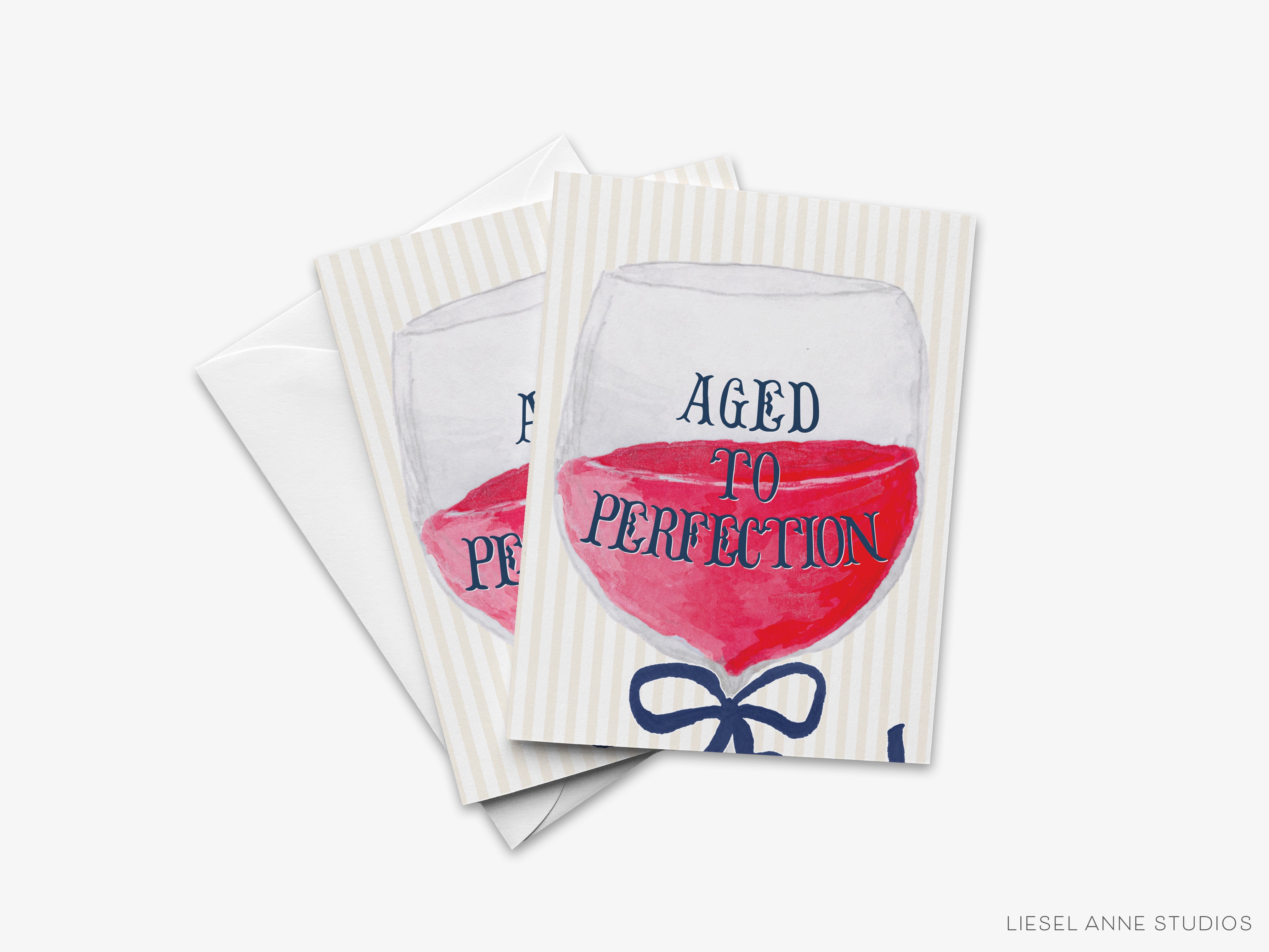 The image is a greeting card with a wine glass illustration and the text "AGED TO PERFECTION" printed on it.