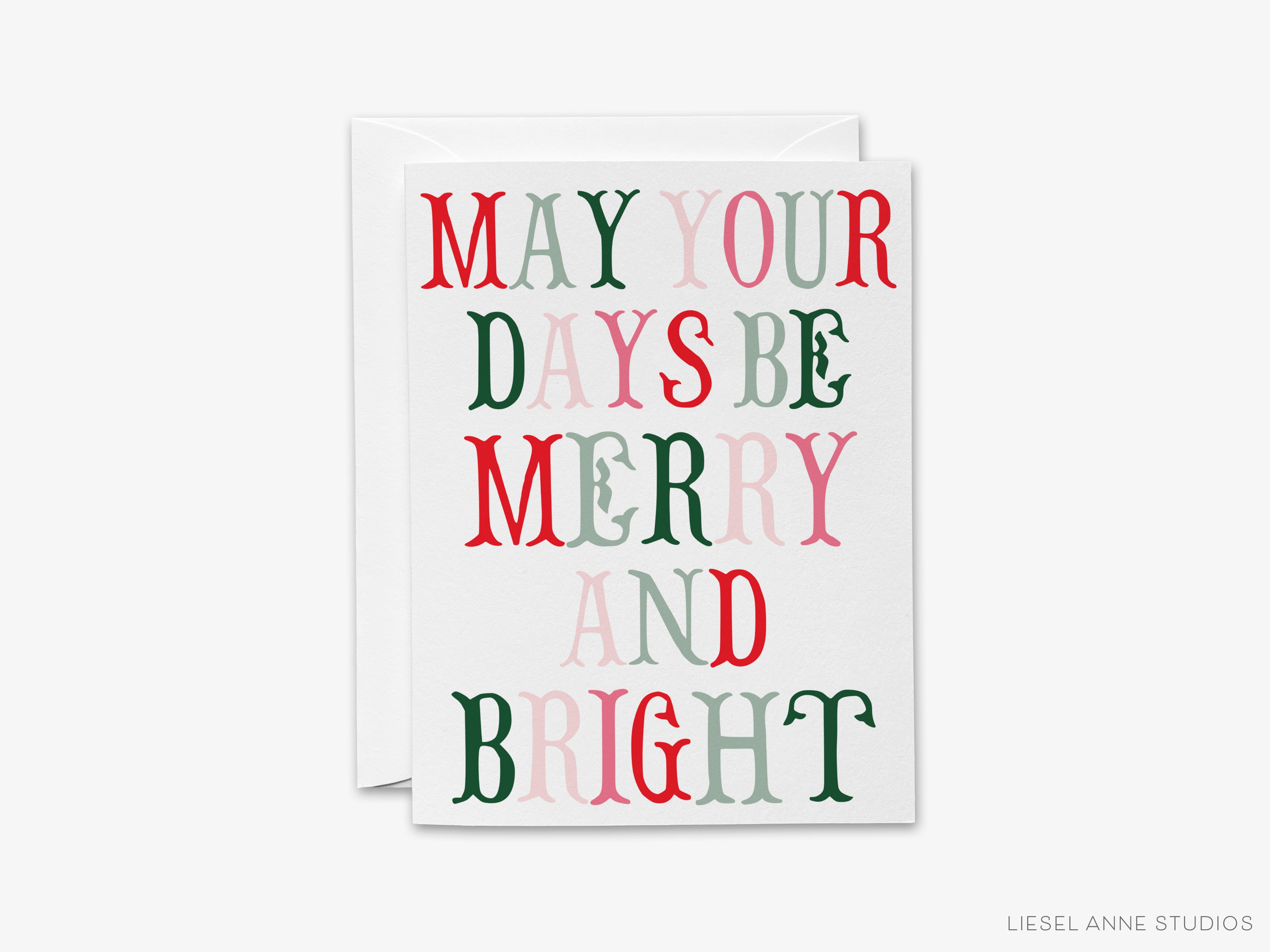 A greeting card with the text "MAY YOUR DAYS BE MERRY AND BRIGHT" printed on it in a colorful, festive font.