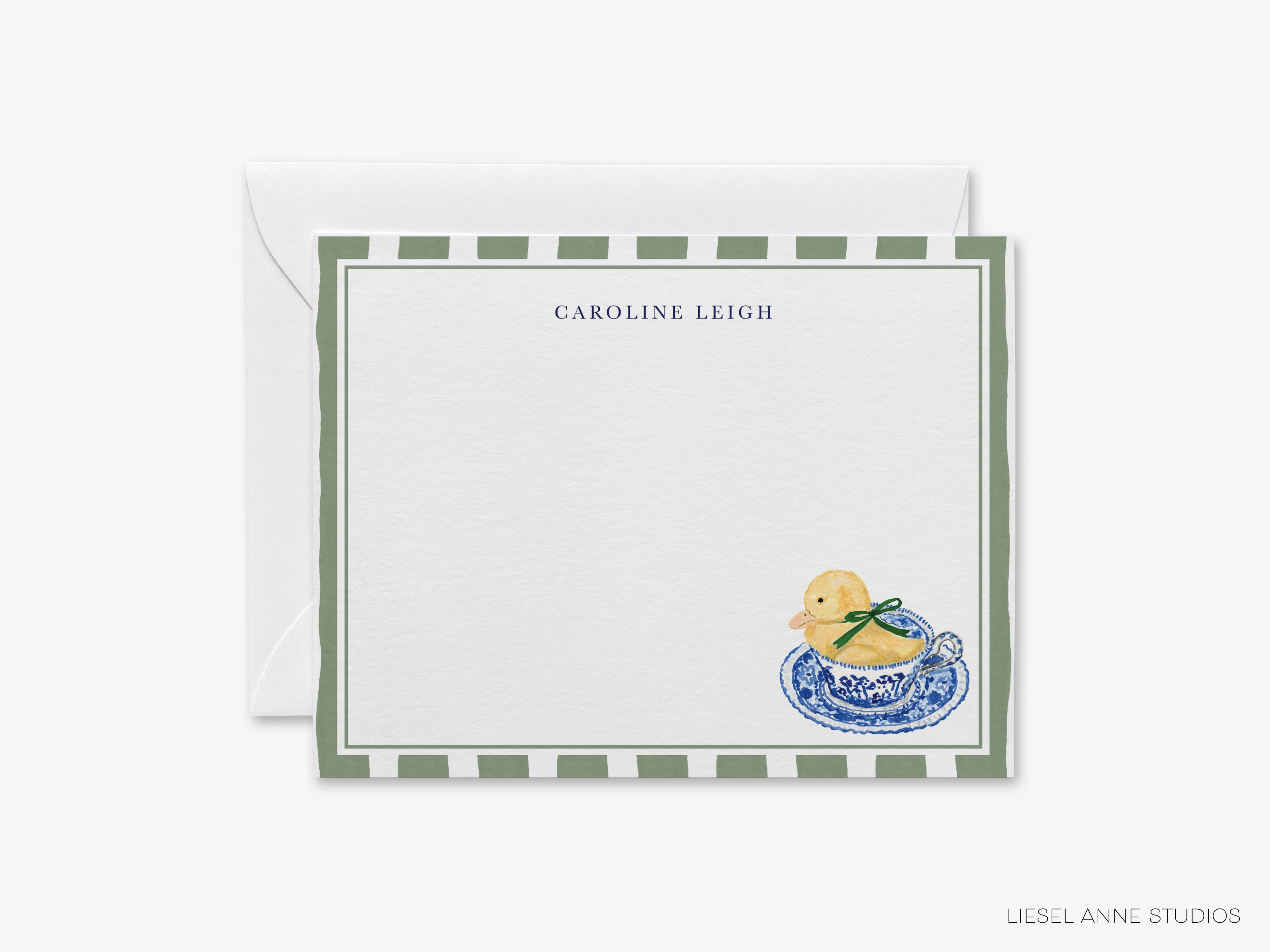 A personalized note card with a green and white striped border, featuring a yellow duck sitting in a blue and white teacup.