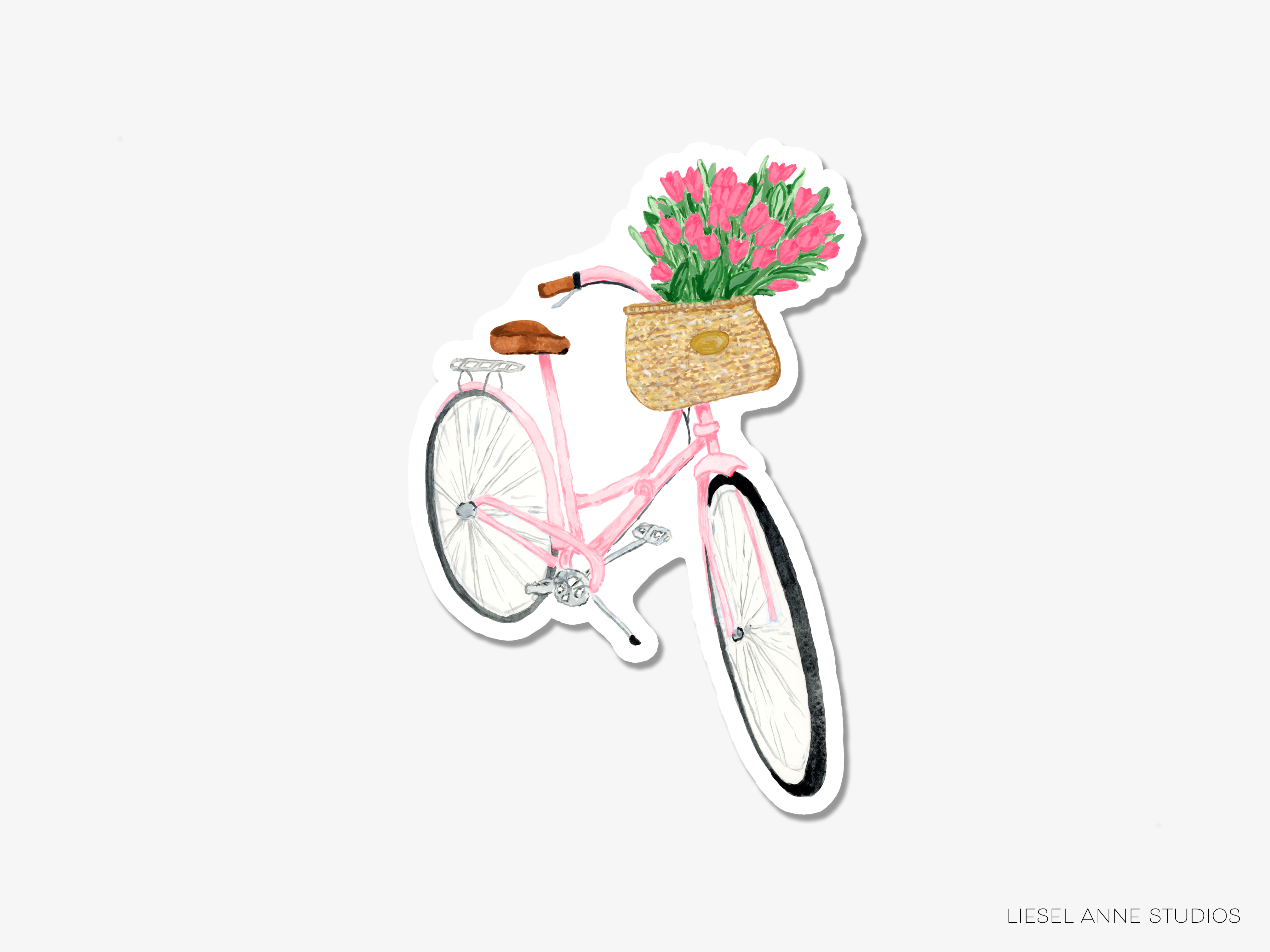 A pink bicycle with a basket filled with pink flowers.