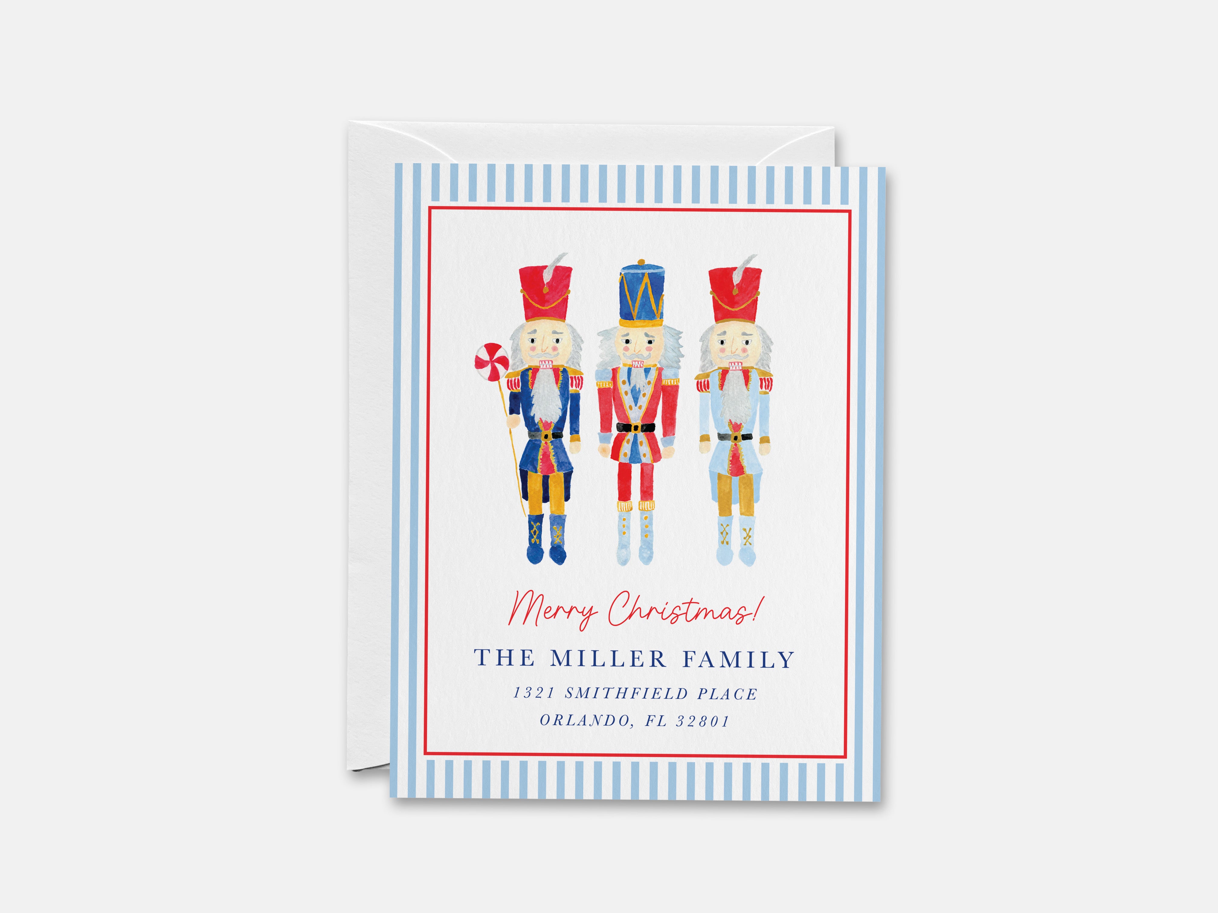 The image is a Christmas card featuring three nutcracker characters in a festive holiday scene.