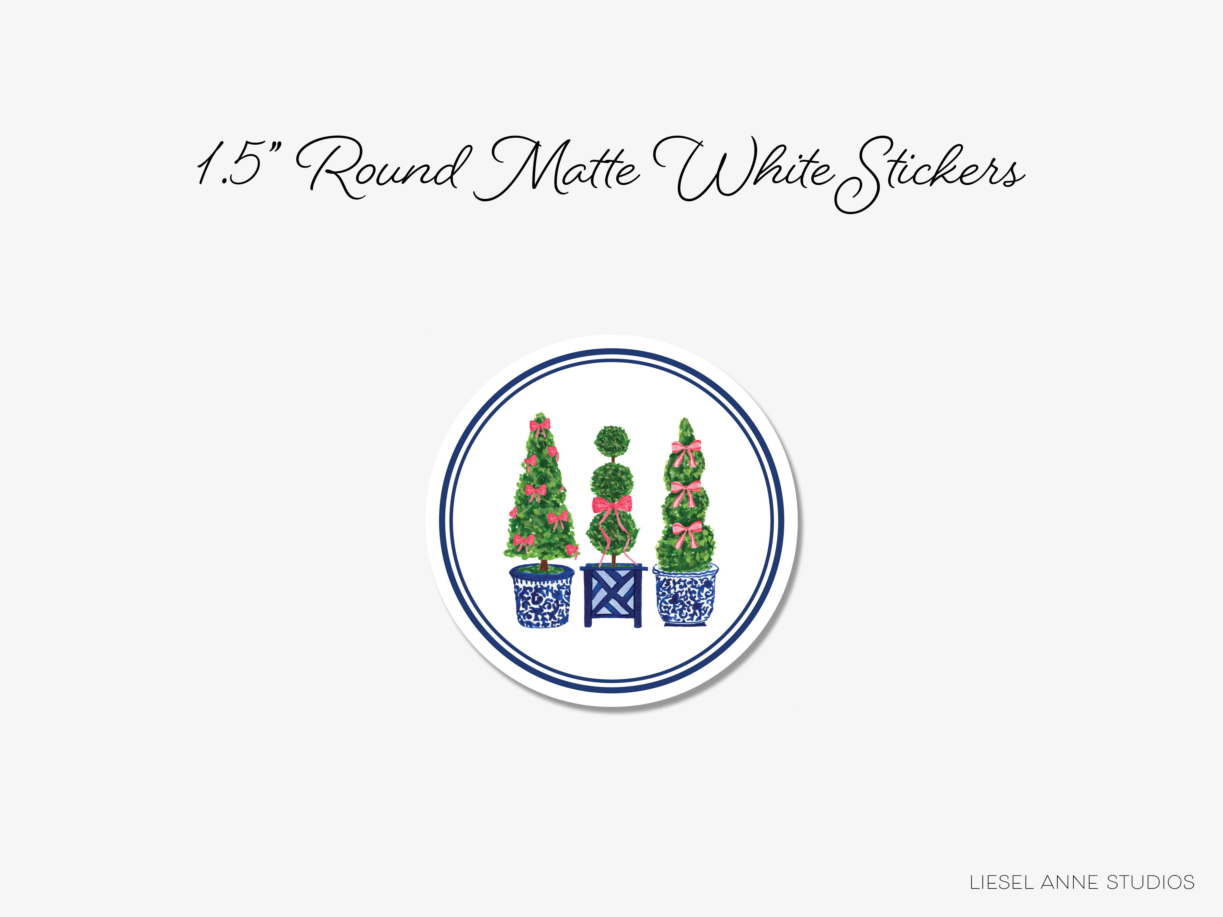 A round sticker with three potted plants, each containing a small tree, arranged in a circular pattern.