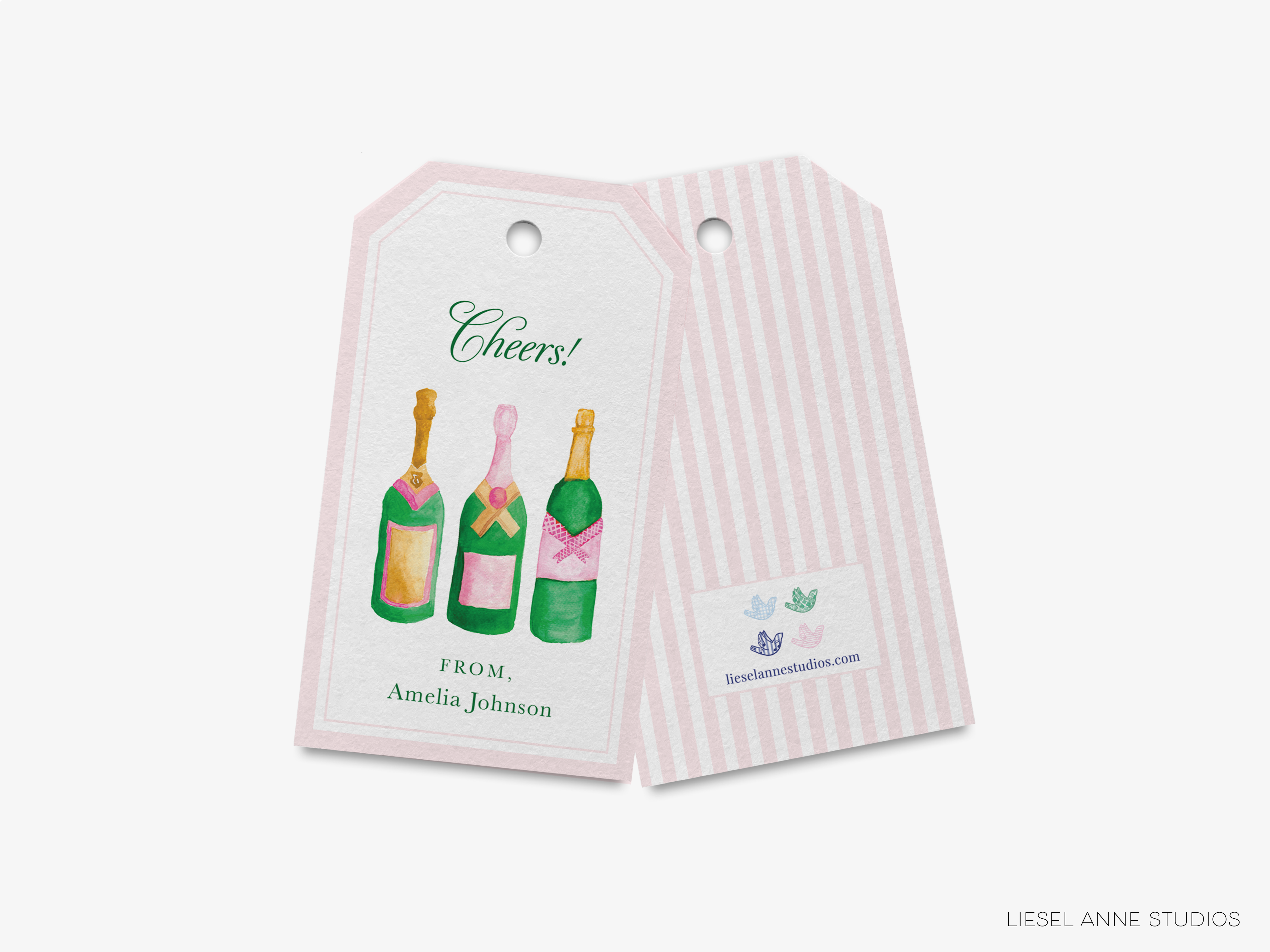 a pink and white striped gift tag with two bottles of champagne