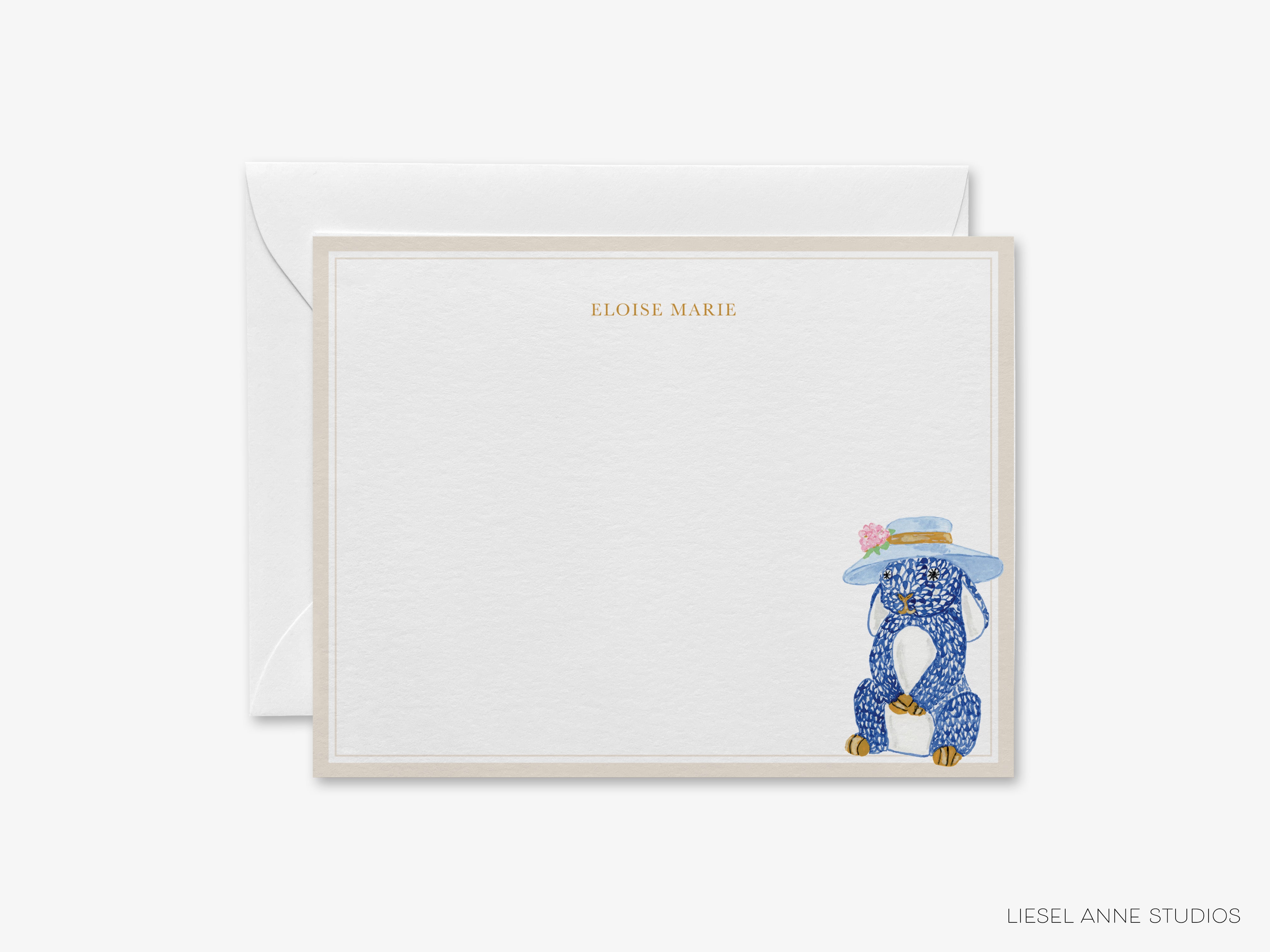 A personalized note card with a blue and white illustration of a dog wearing a hat, and the name "ELOISE MARIE" printed on it.