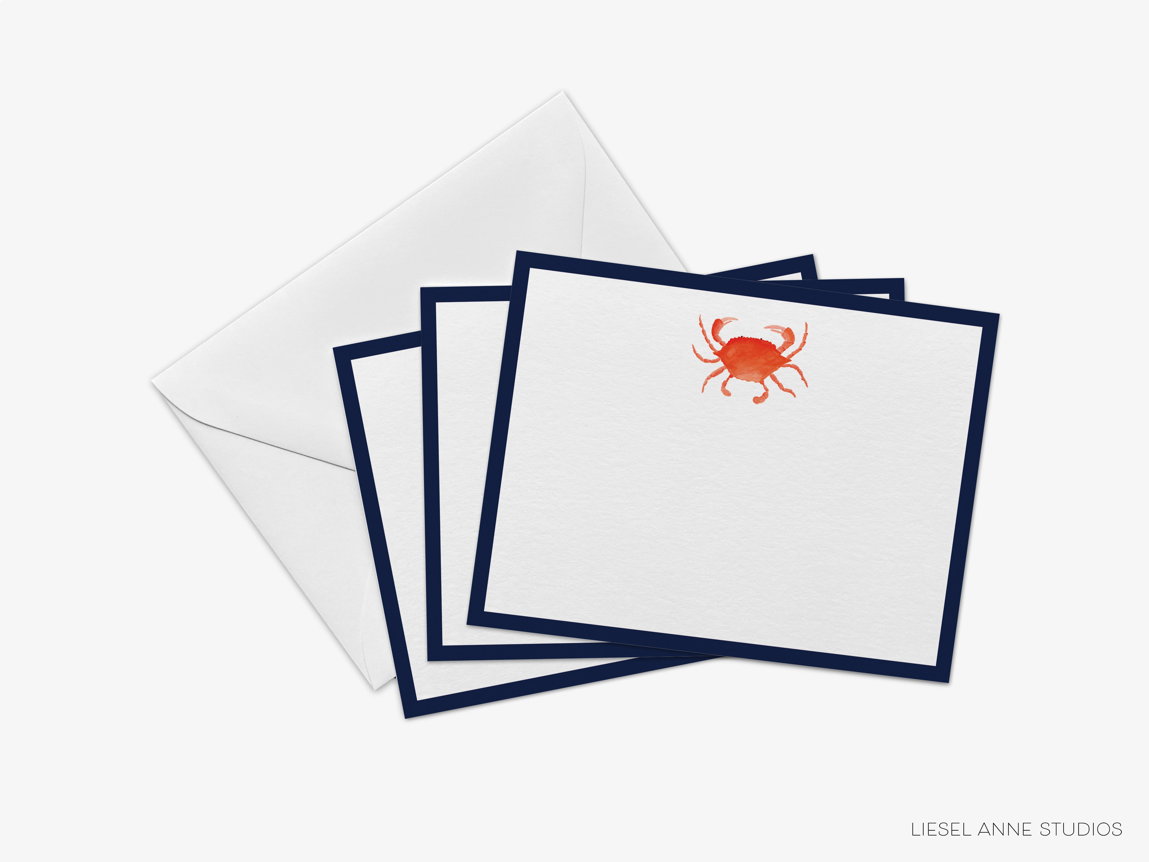 A set of four square cards with a navy blue border and a red crab illustration on the top card.