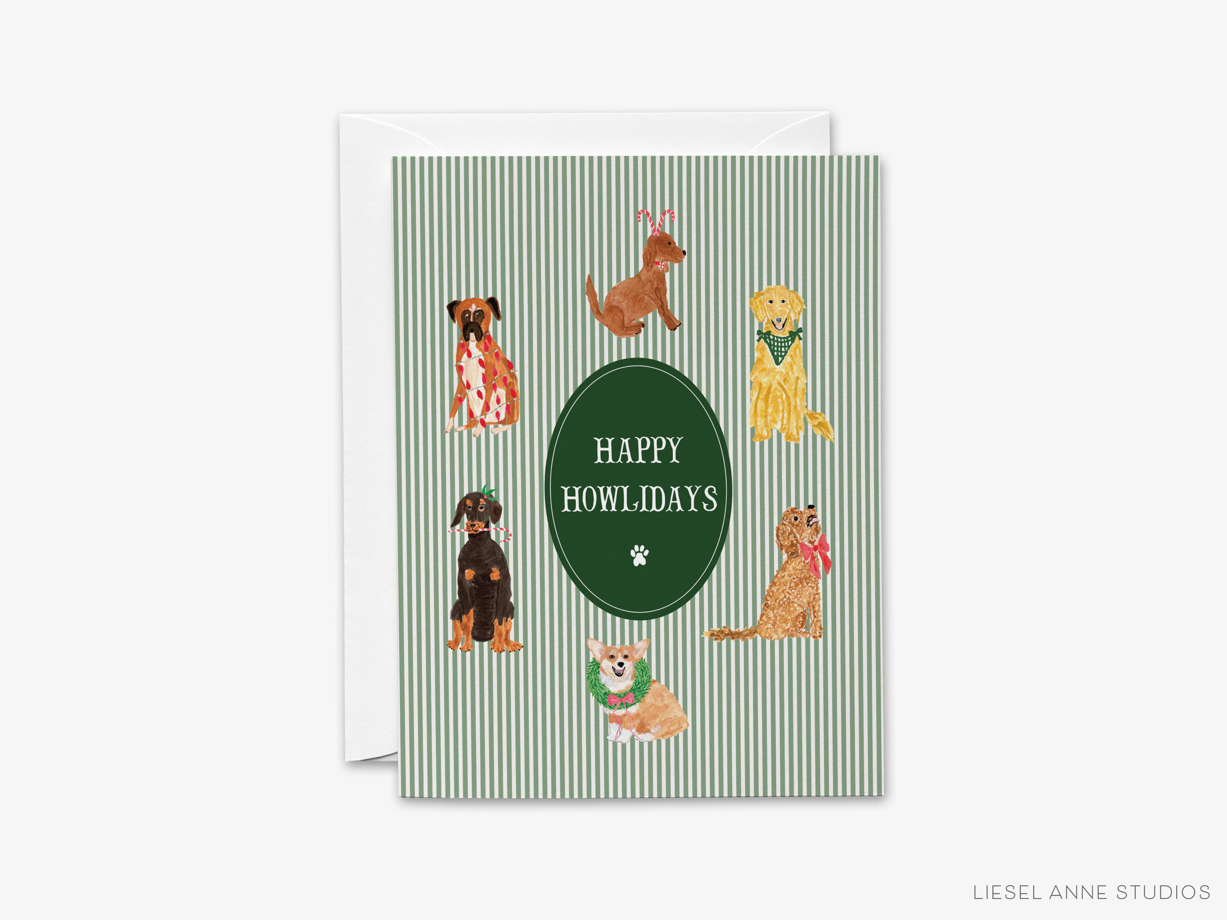 A greeting card featuring illustrations of various dog breeds, including a golden retriever, a corgi, a beagle, a poodle, a husky, and a bulldog, all wearing festive holiday-themed outfits. The card has a green background with a white border, and the text "HAPPY HOWLIDAYS" is displayed in the center.