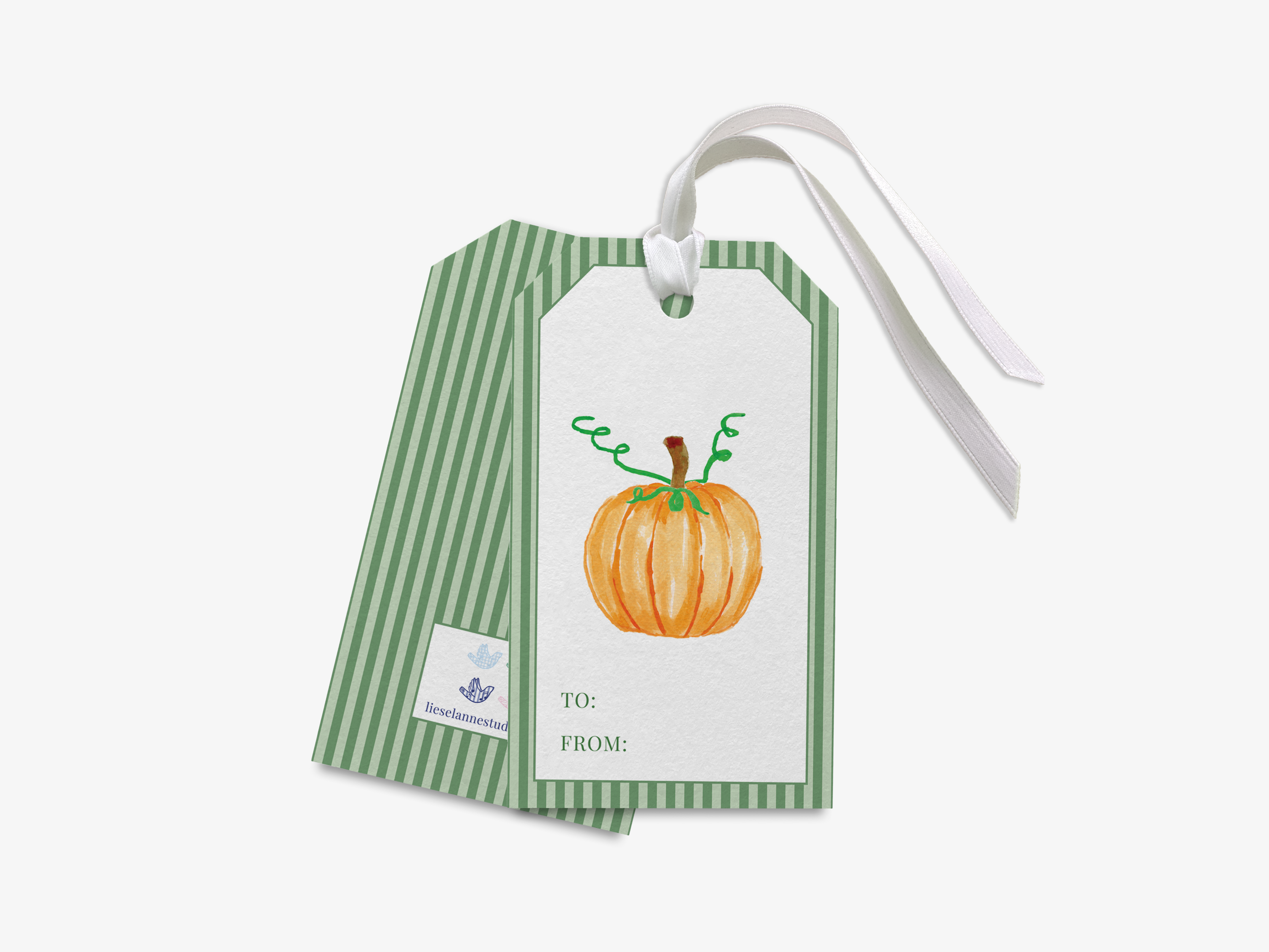 a green and white striped gift tag with a pumpkin illustration on it.