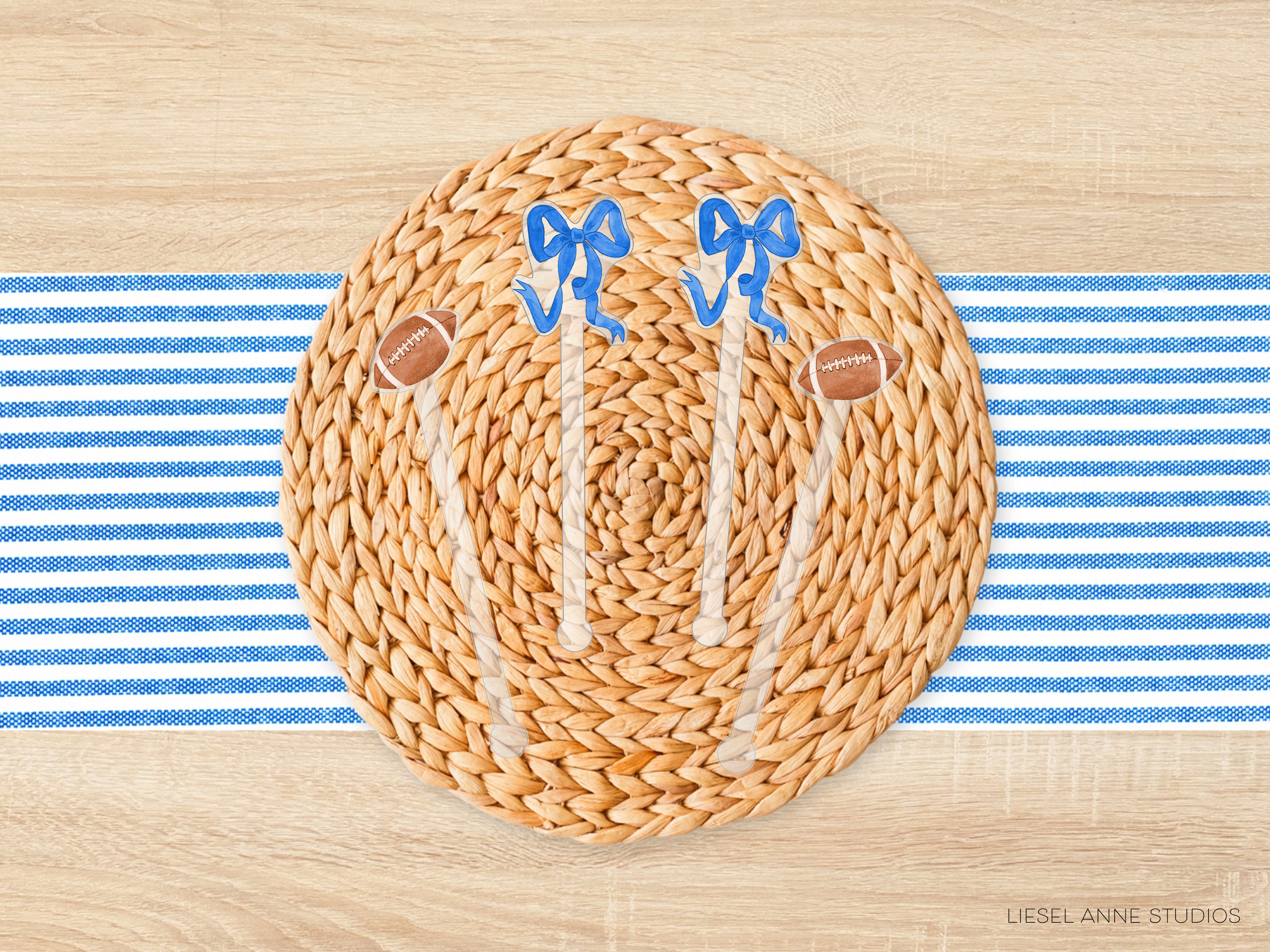 a woven placemat with a football motif, including two blue bows and a brown football, placed on a blue and white striped tablecloth.
