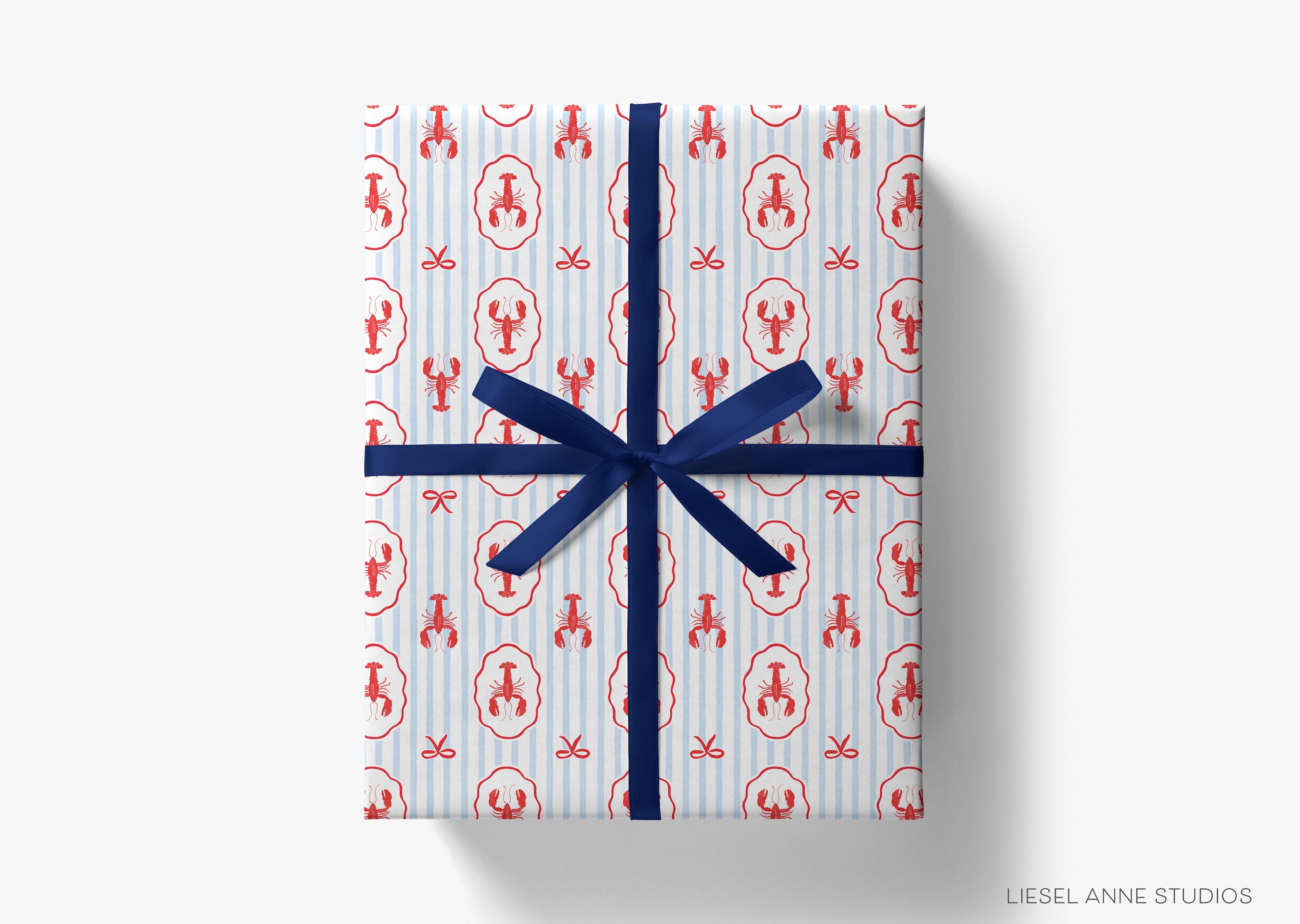 a wrapped gift box with a blue ribbon