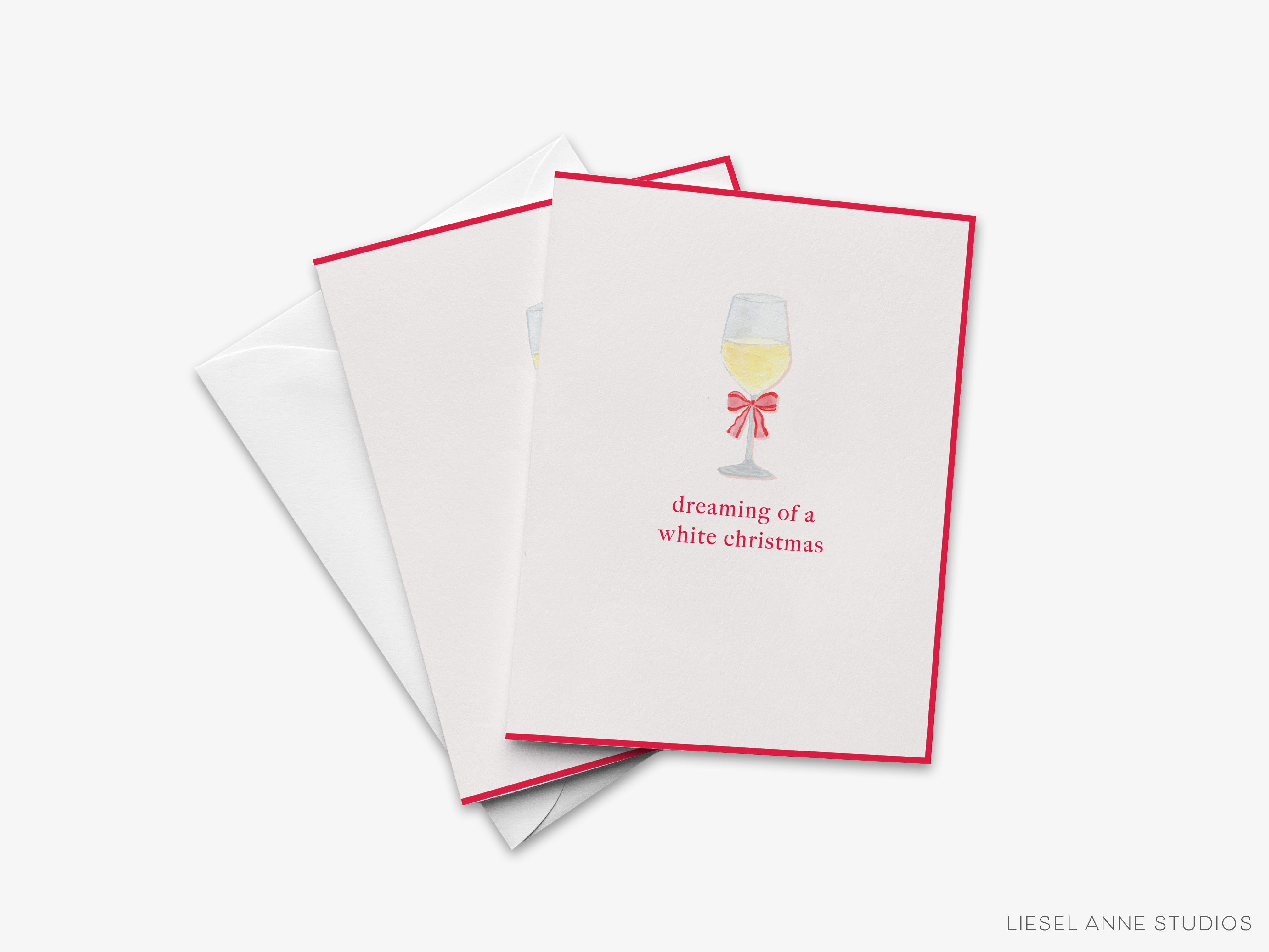A set of three white greeting cards with red borders, each featuring a wine glass illustration and the text "dreaming of a white christmas".