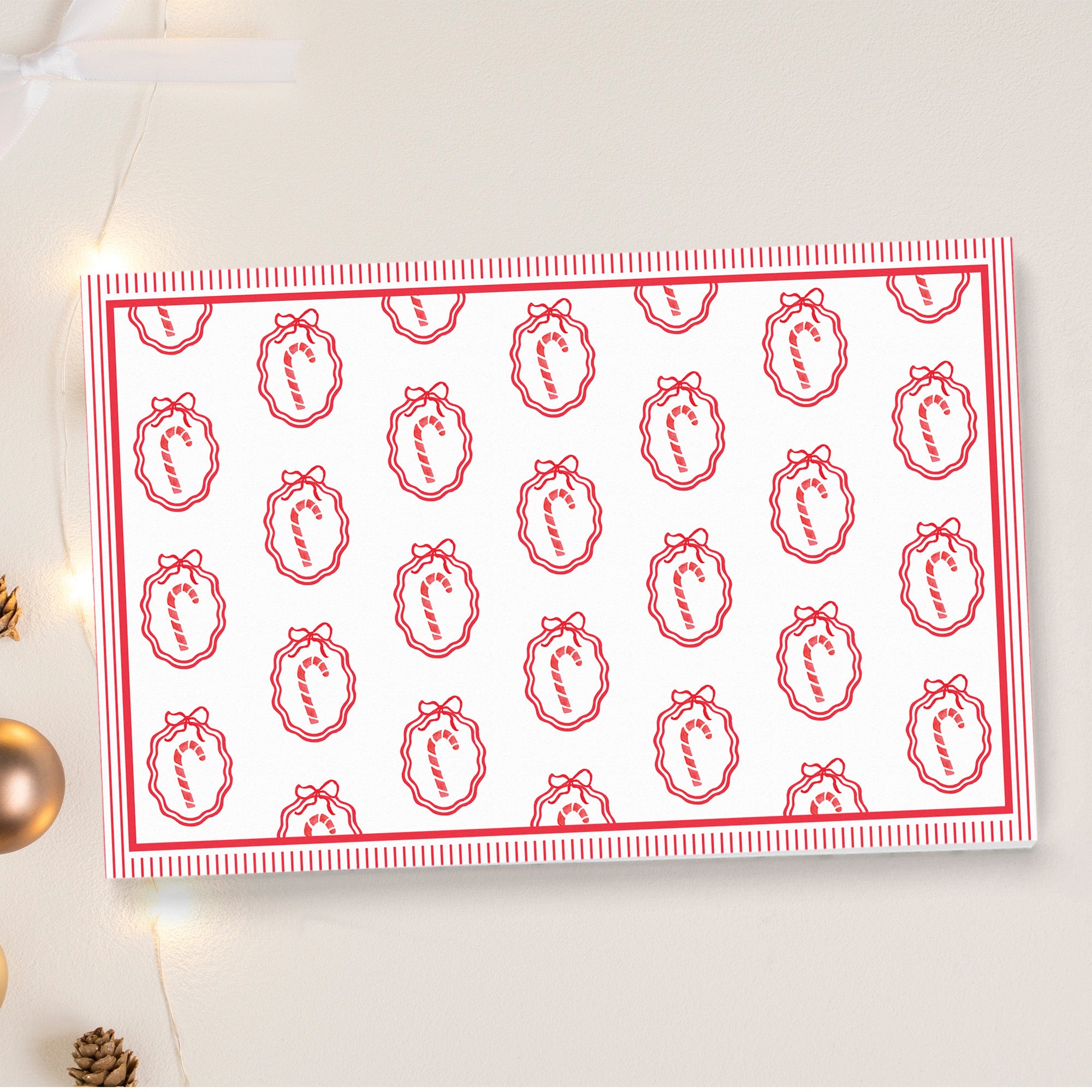 a repeating pattern of red and white candy canes on a white background, creating a festive and holiday-themed design.