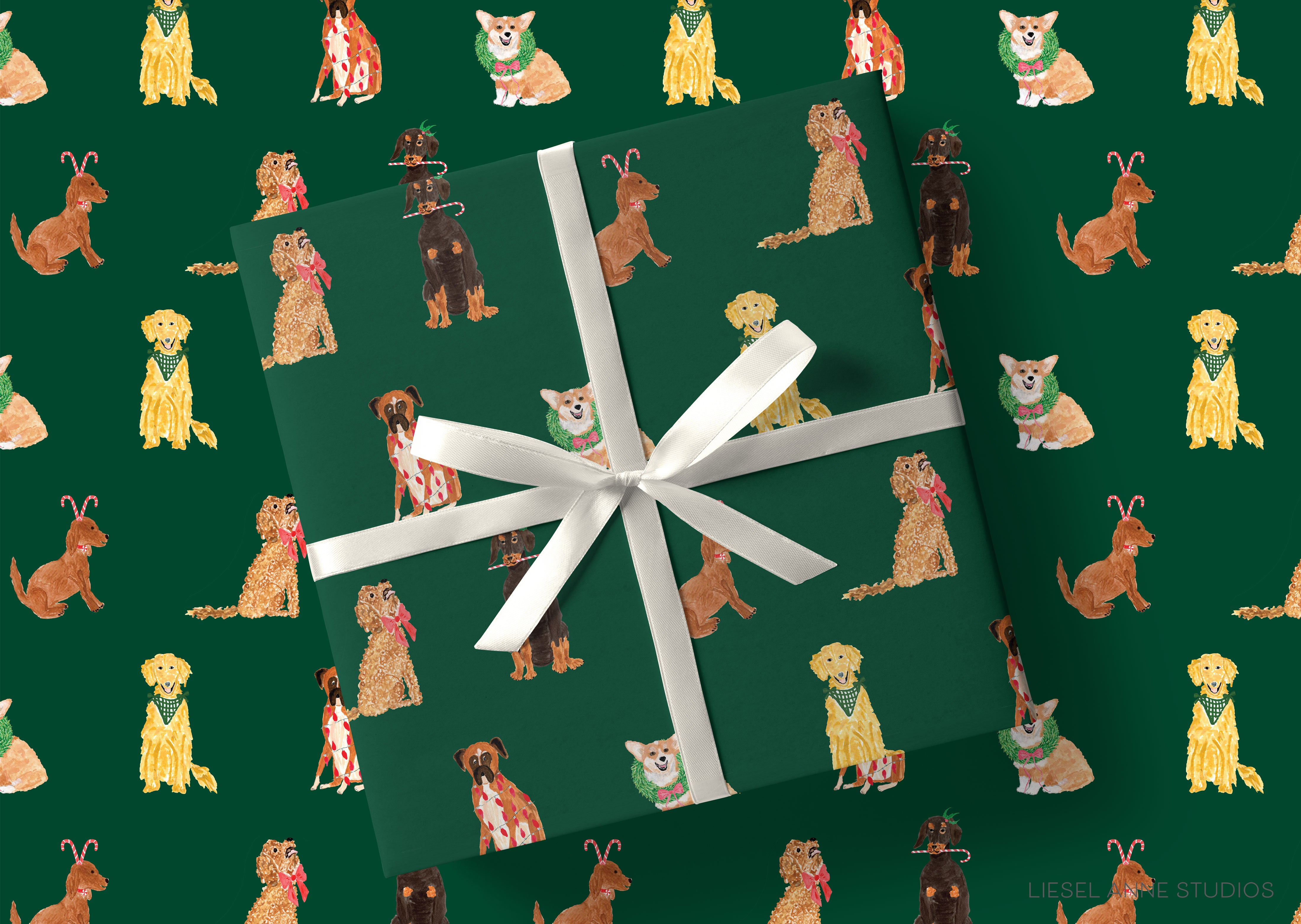a pattern of various dog breeds on a green background, with a white ribbon tied around a gift box in the center.