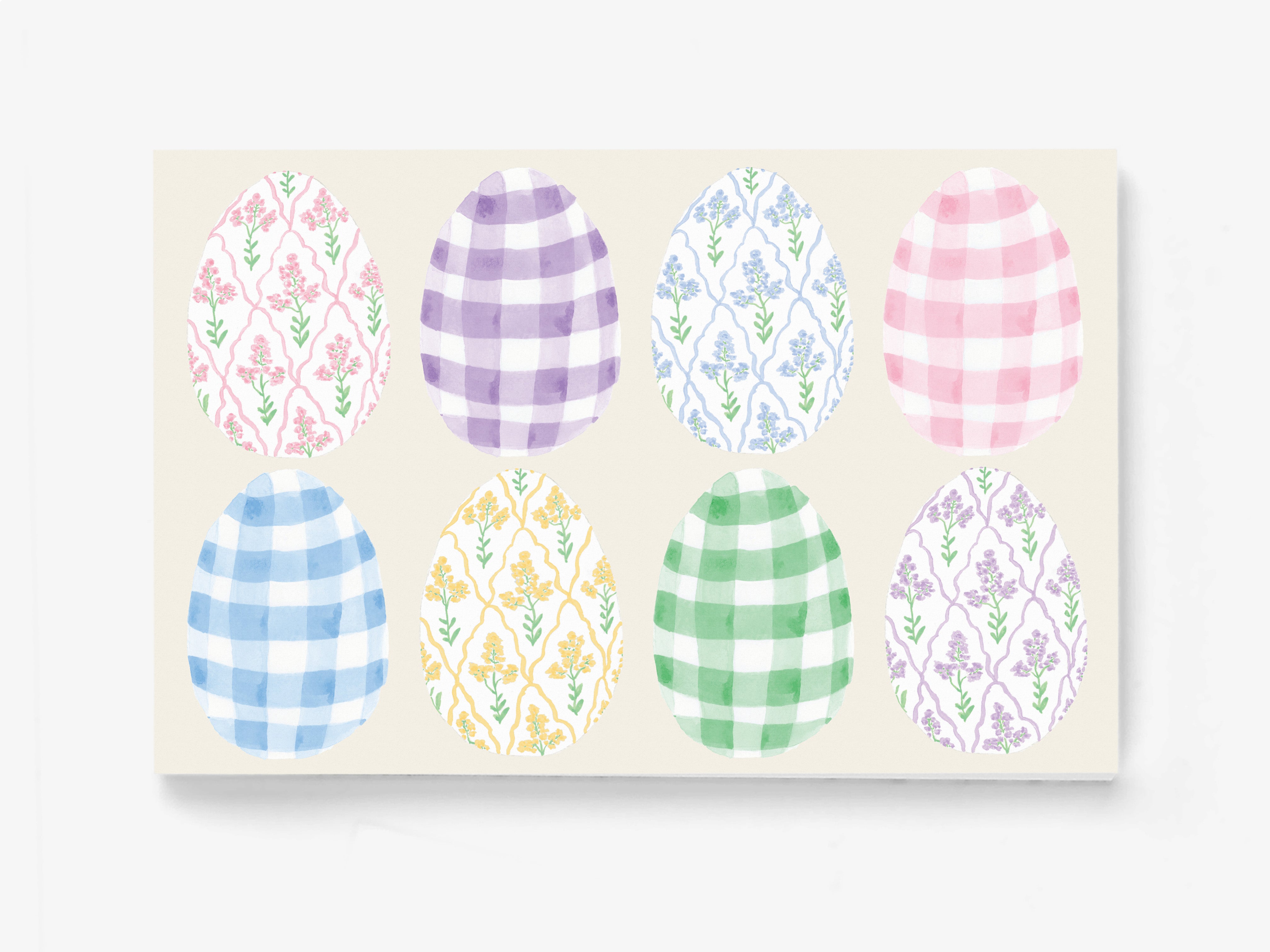 a collection of eight Easter eggs, each with a unique pattern and color, arranged in a grid-like pattern.