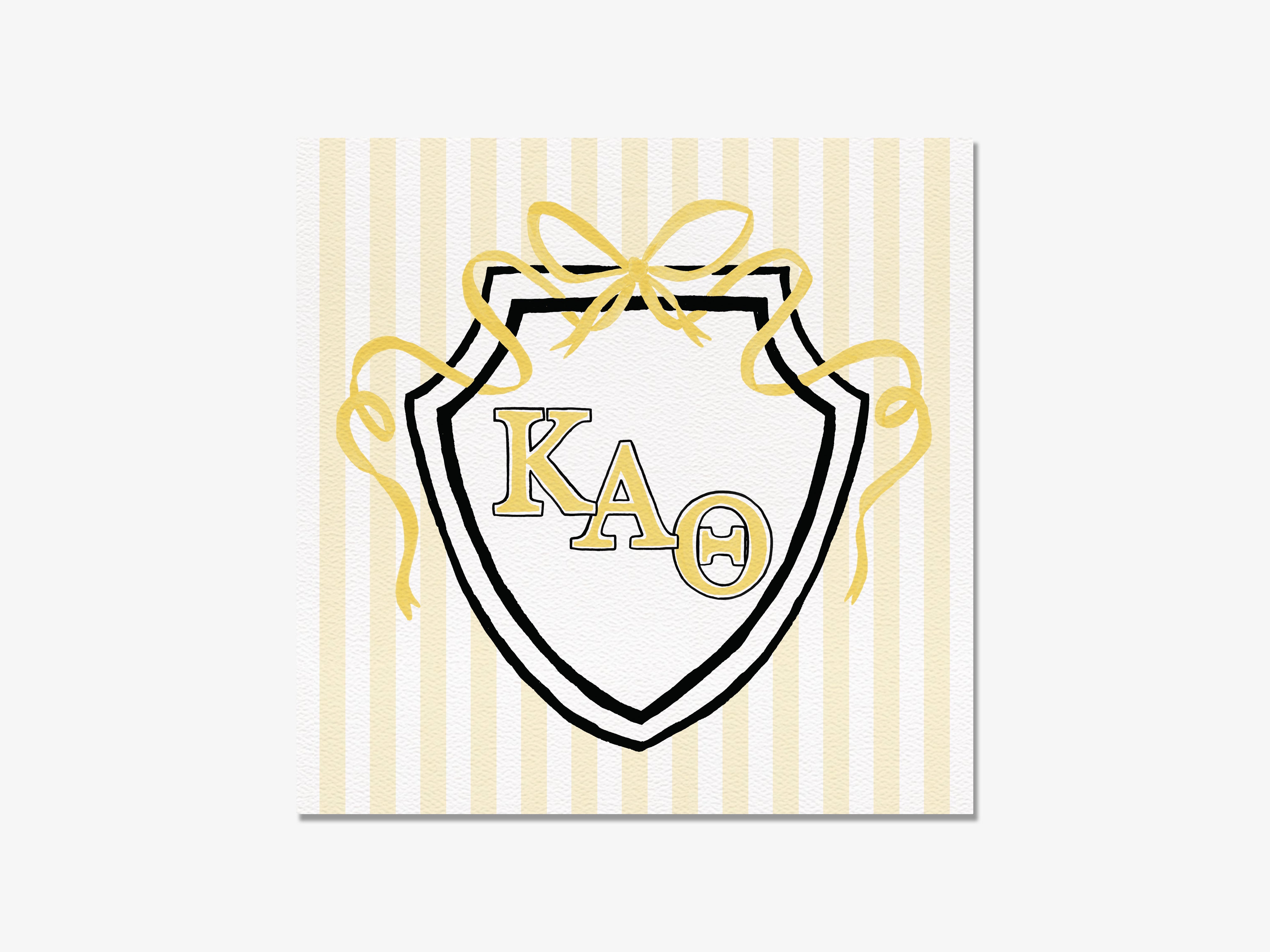 A shield-shaped logo with the letters 'KA' in the center, surrounded by a decorative ribbon and striped background.