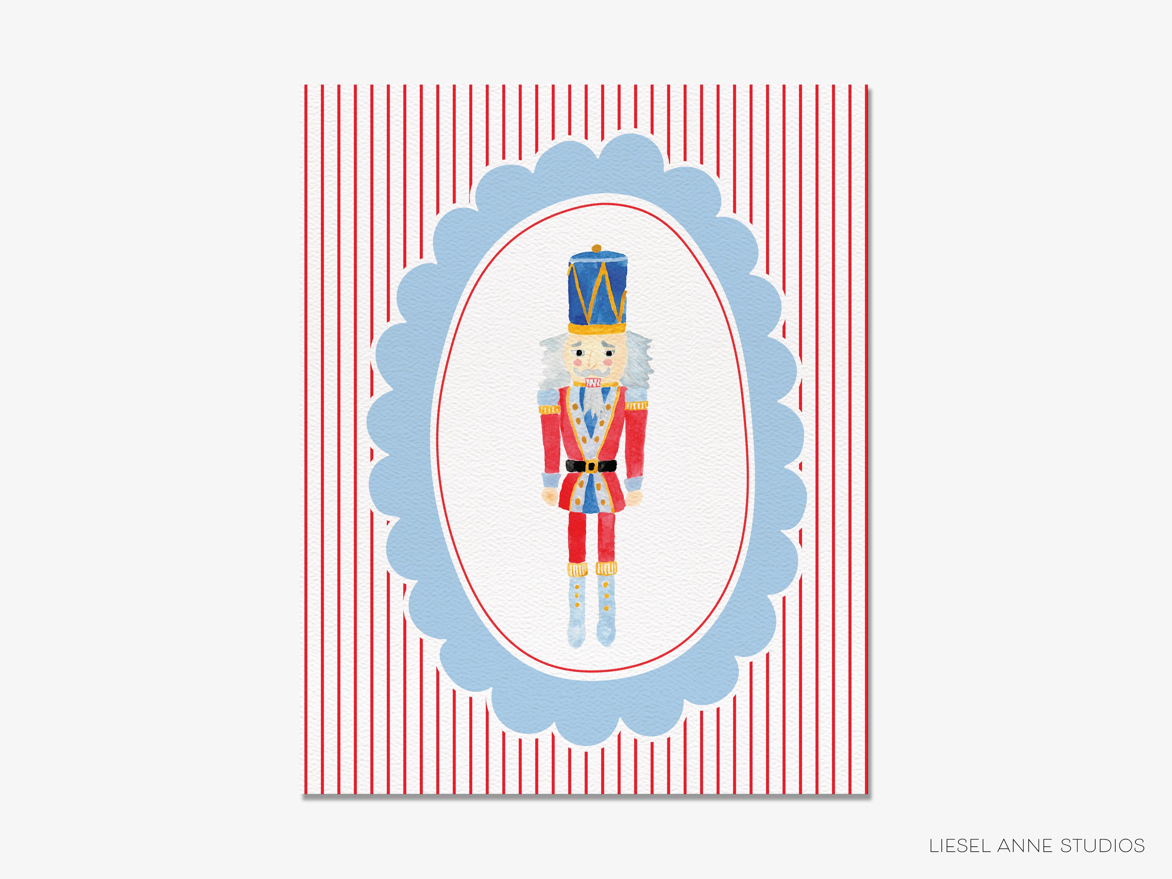 A nutcracker figure in a red and blue outfit, standing in the center of a blue oval frame with red and white striped background.