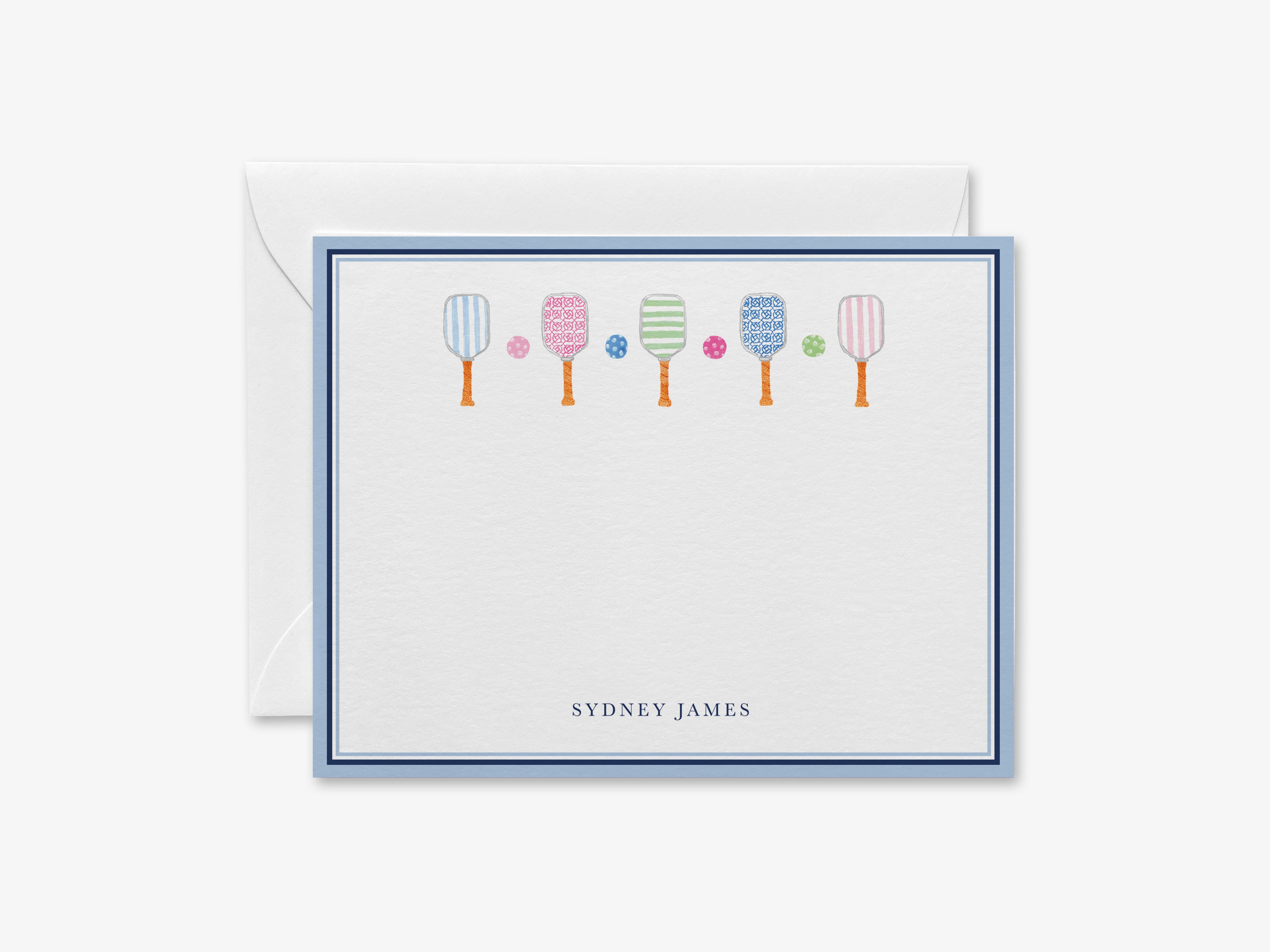 A personalized greeting card with a blue border and illustrations of colorful paddleboards.