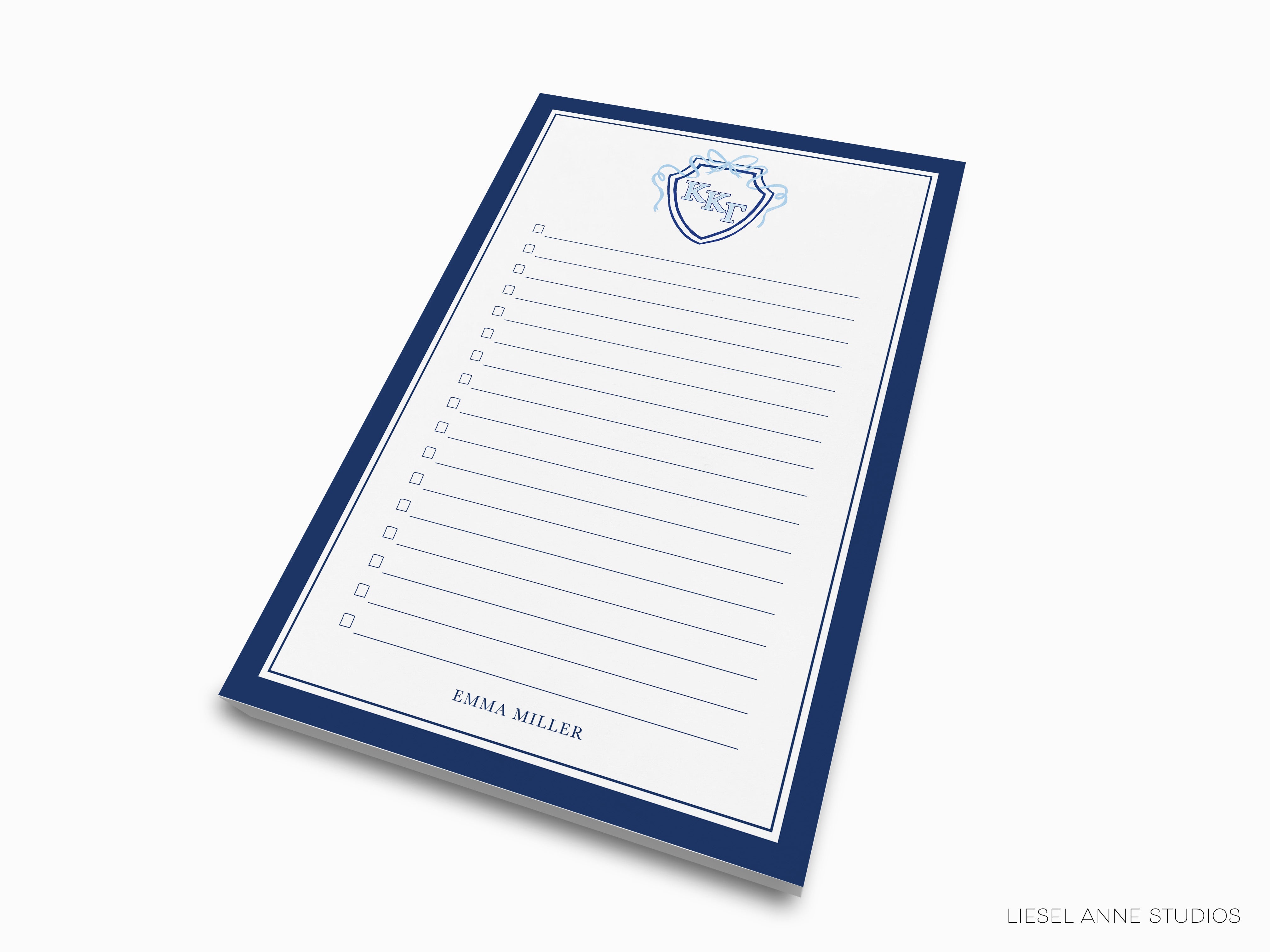 a blue and white notepad with a shield on it