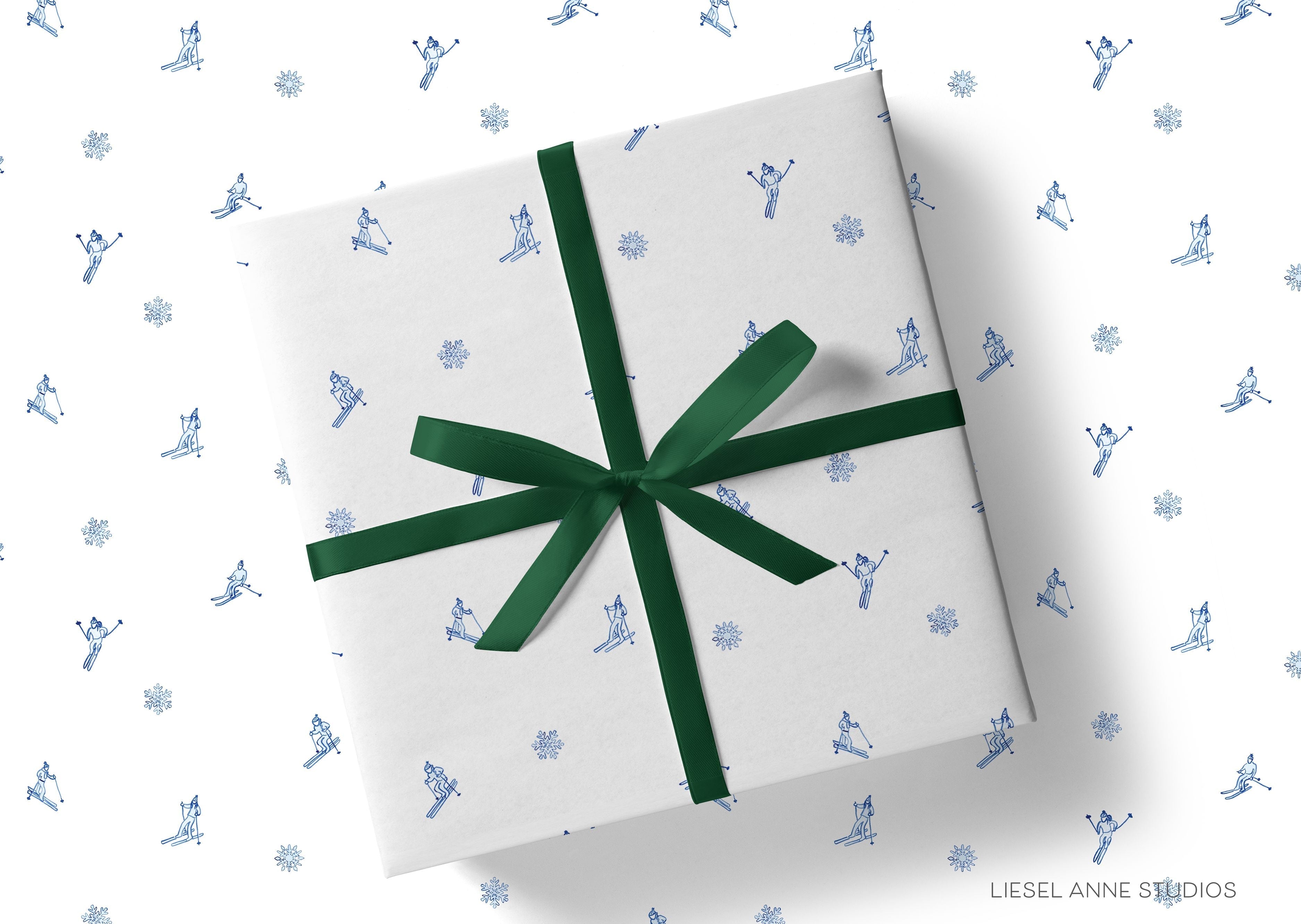 Après Ski White and Blue Gift Wrap-This matte finish gift wrap features our hand-painted watercolor snowflakes and skiers design. It makes a perfect wrapping paper for a holiday present. -The Singing Little Bird