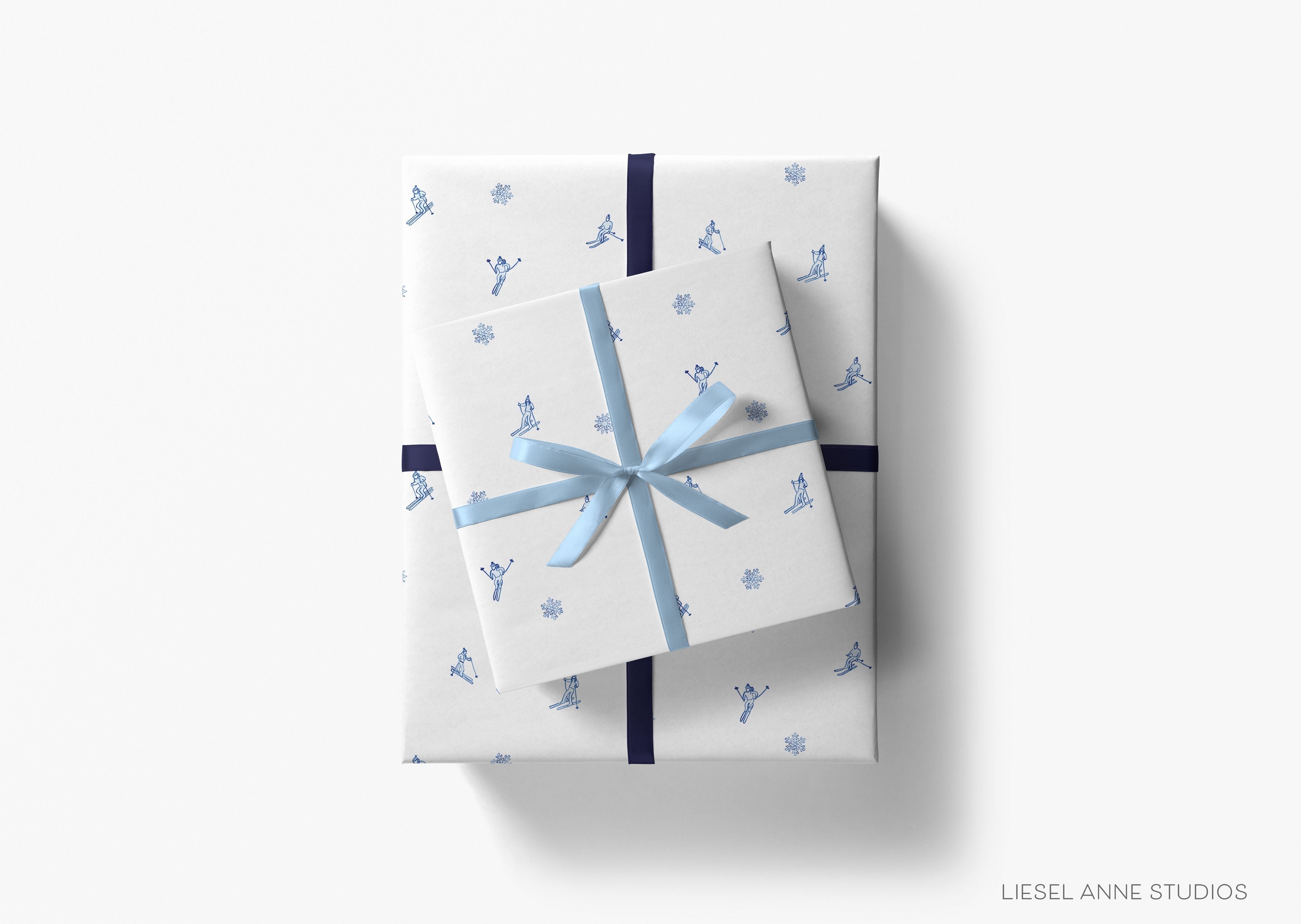 Après Ski White and Blue Gift Wrap-This matte finish gift wrap features our hand-painted watercolor snowflakes and skiers design. It makes a perfect wrapping paper for a holiday present. -The Singing Little Bird